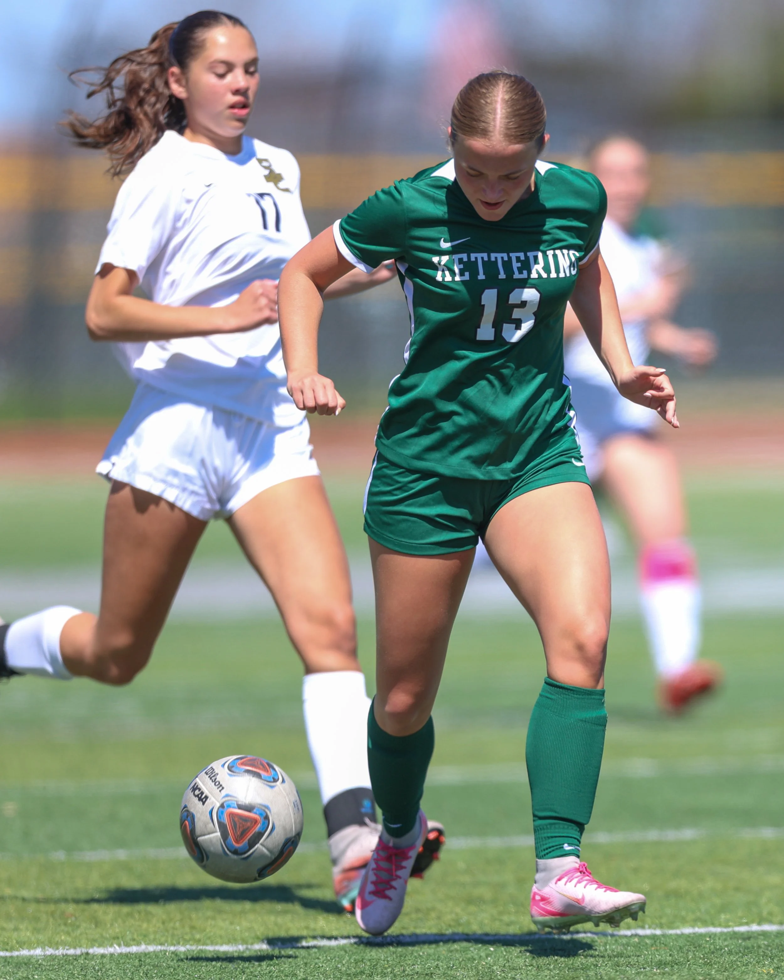 #13 controls the ball