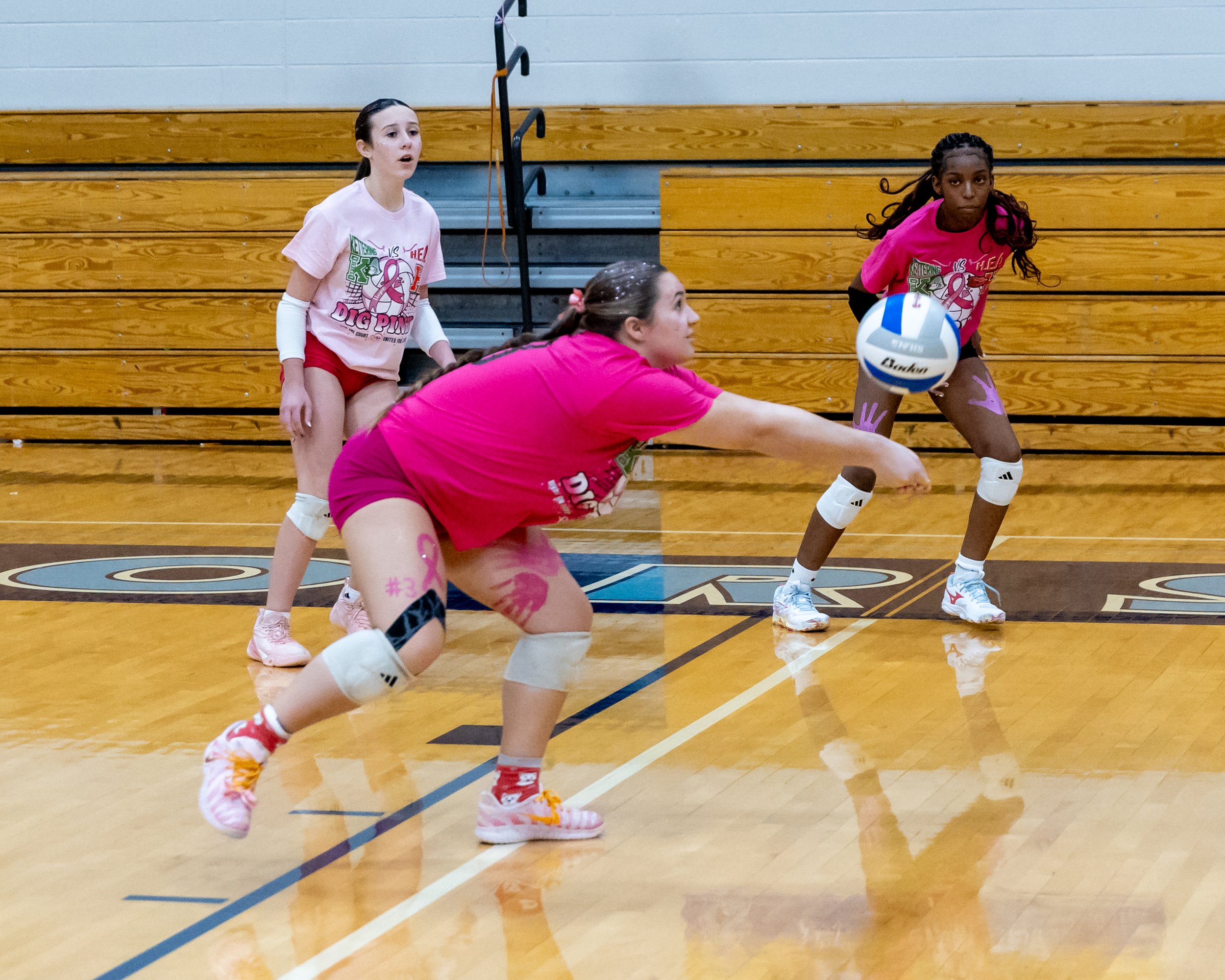 Kettering player hits the ball