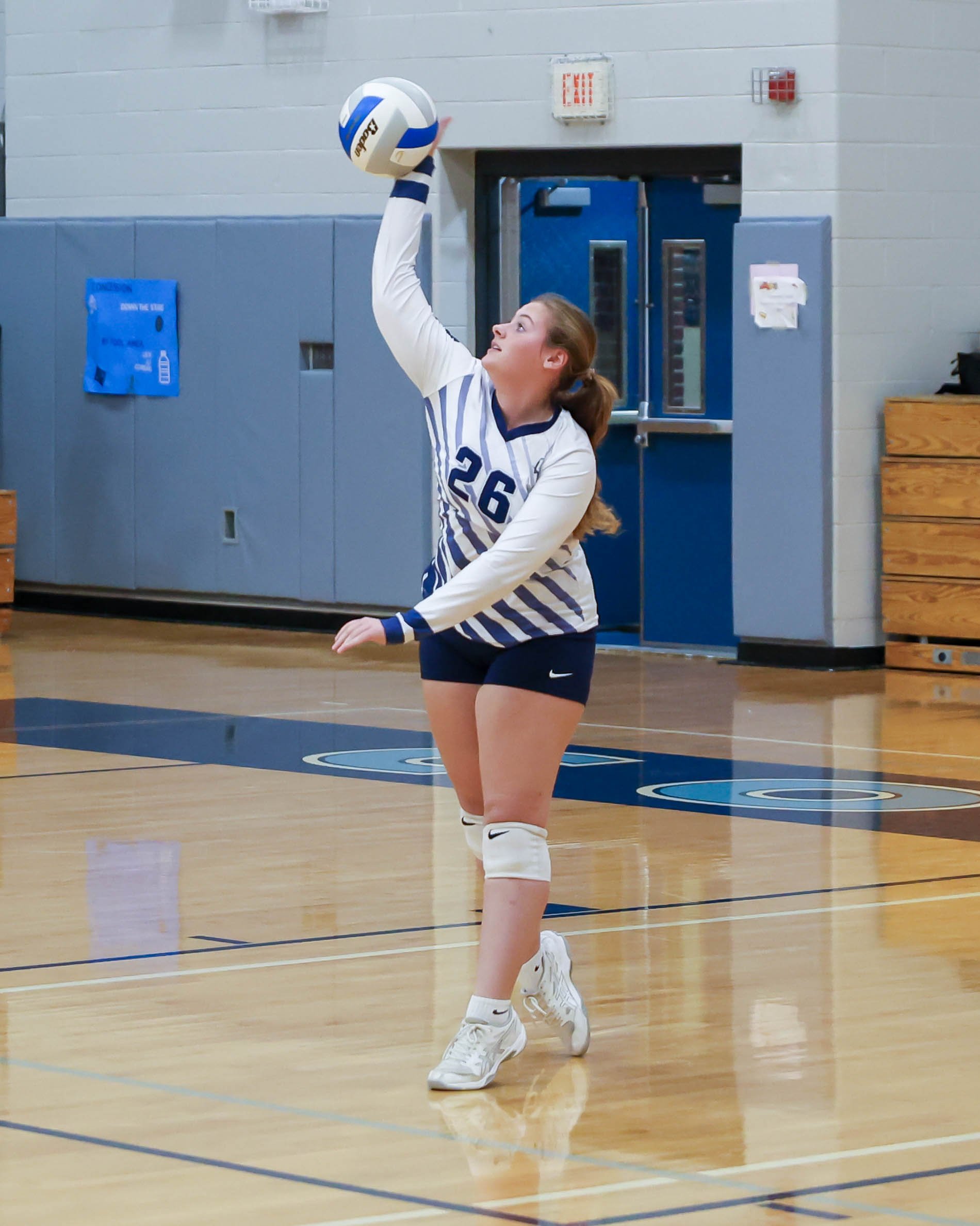 Mott #26 serves the ball