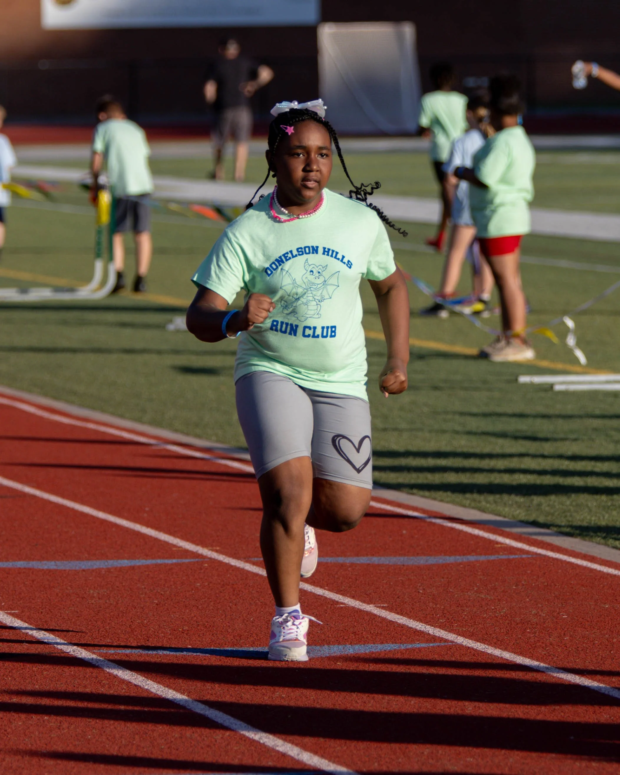 Donelson Hills runner at the finish line