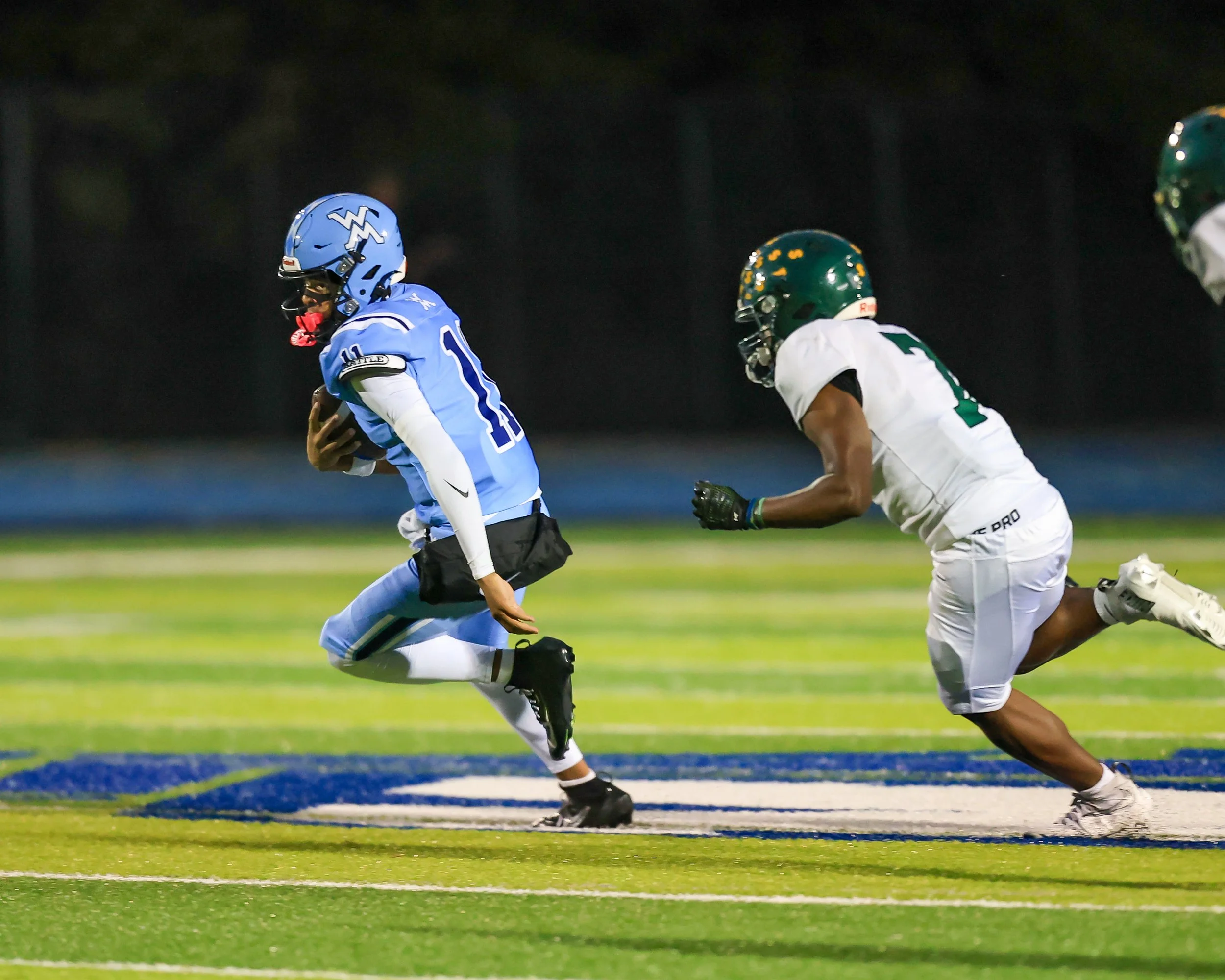 Mott #11 runs with the ball