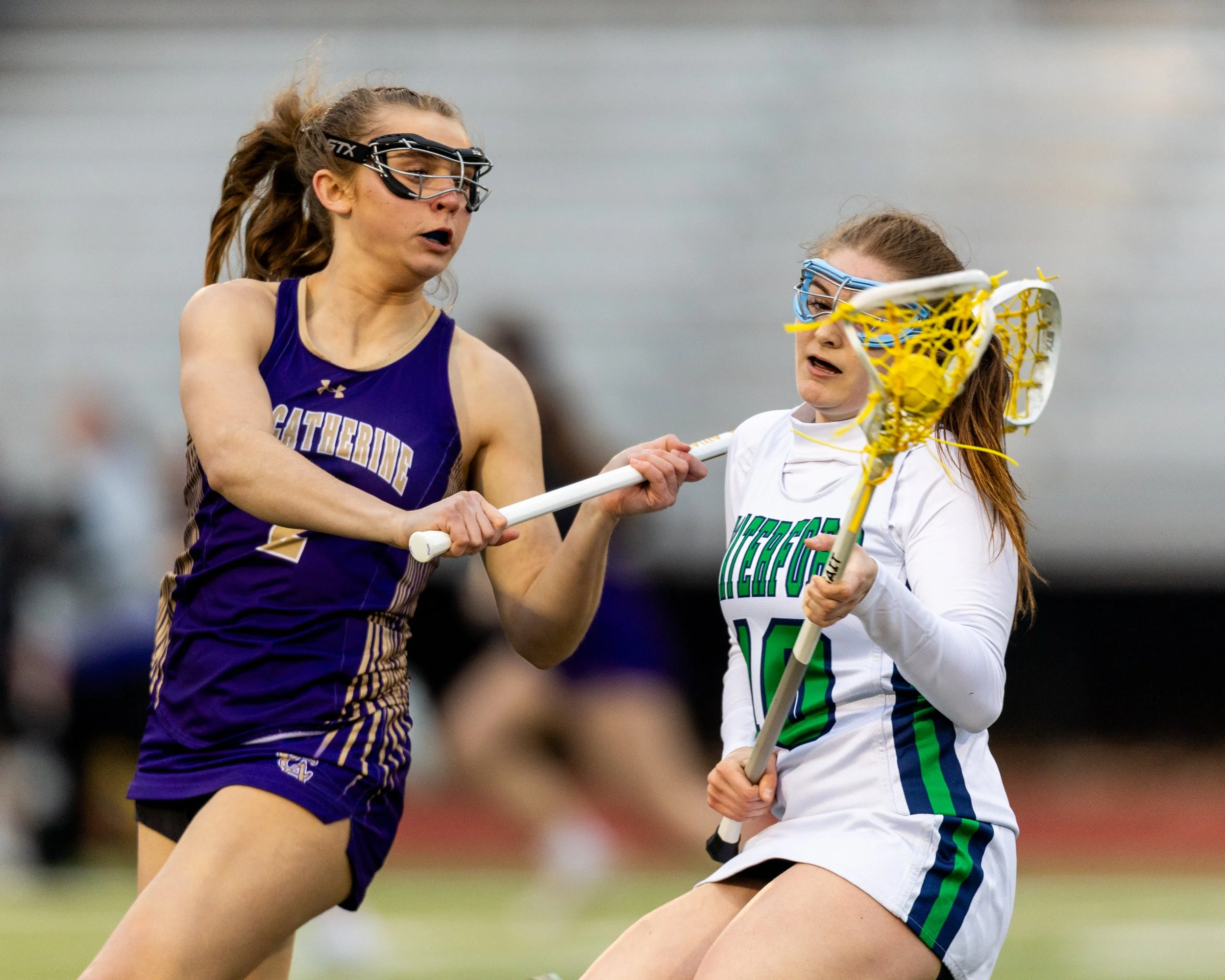 #10 with the ball and a defender