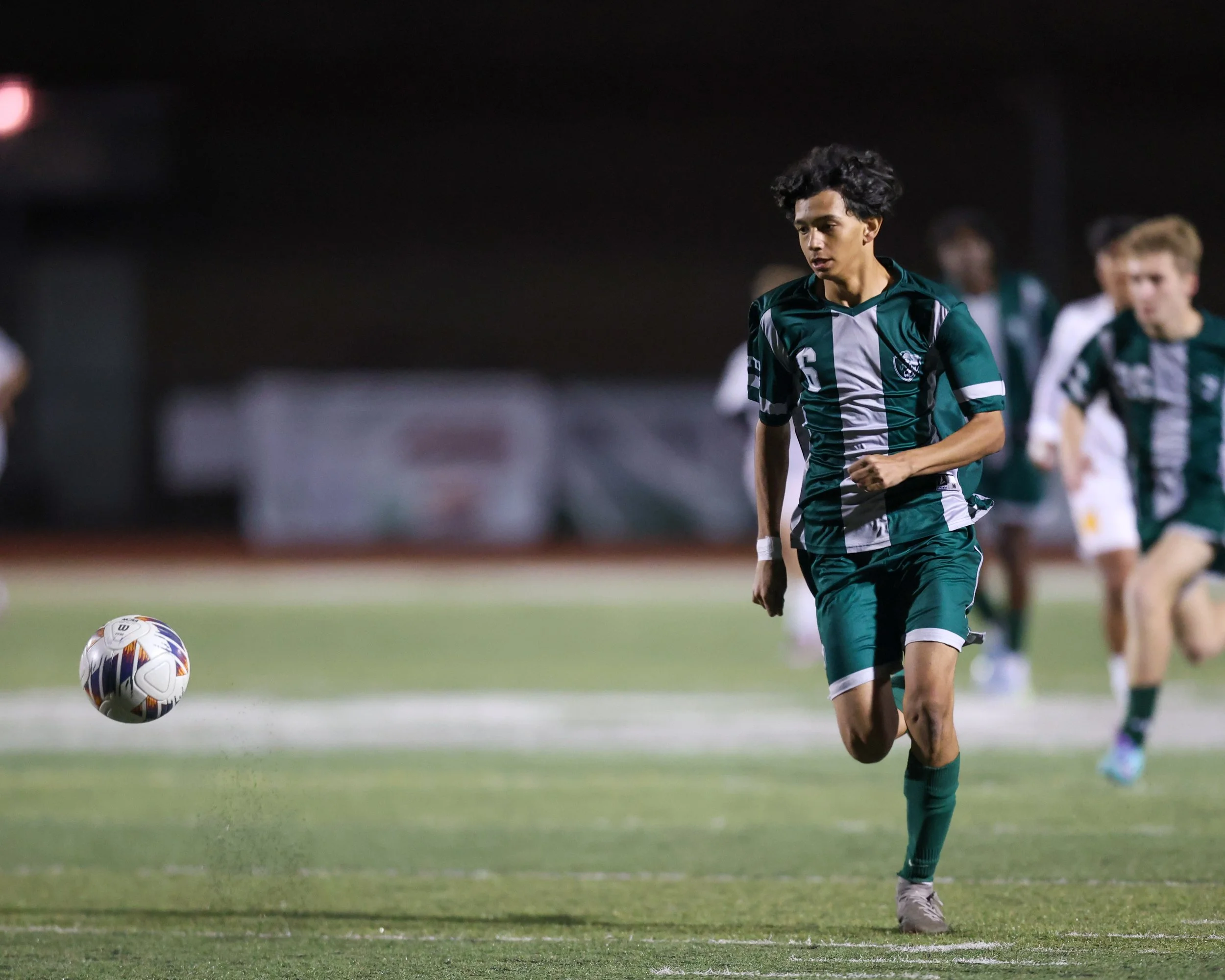 WK #6 watches the ball