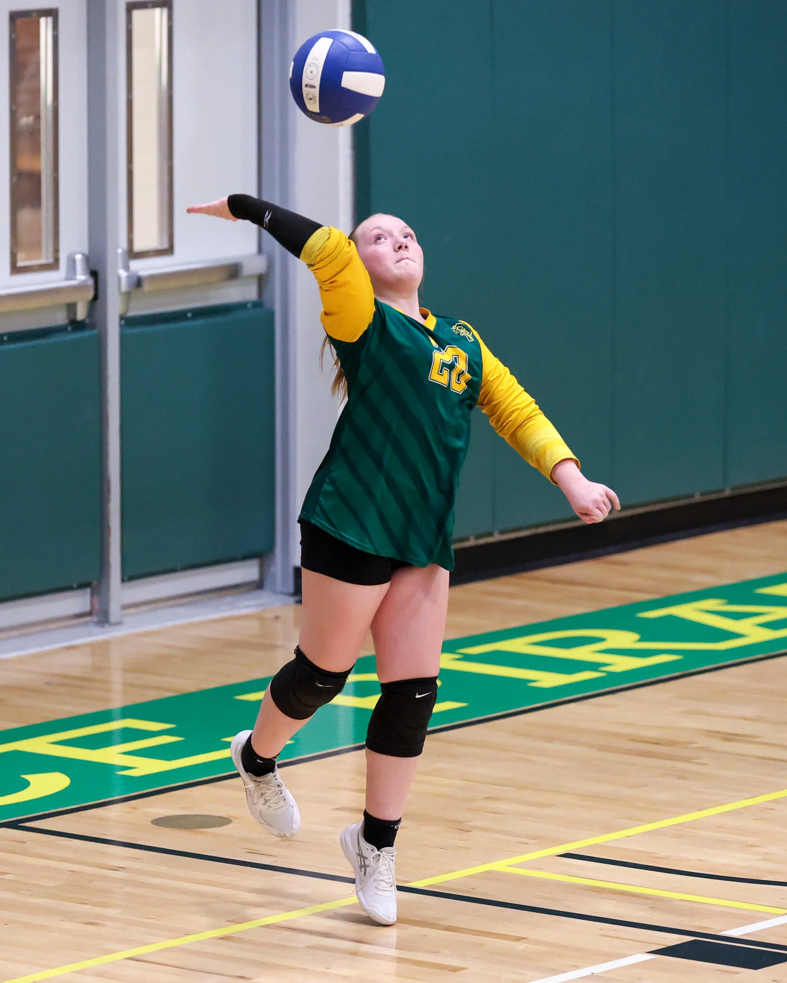 Pierce serves the ball