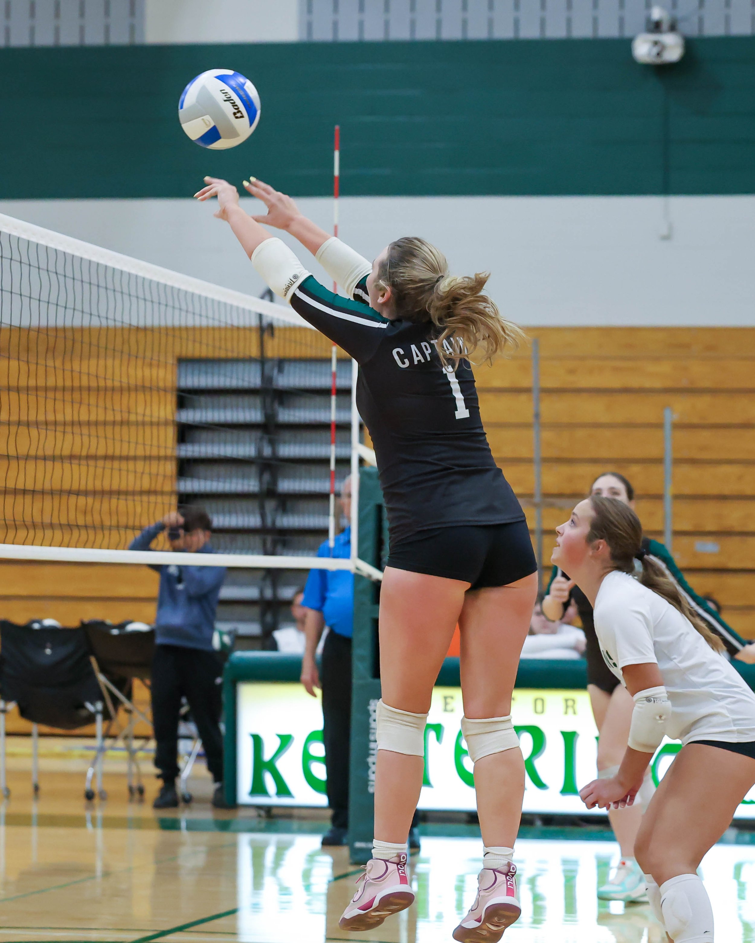 Kettering #1 returns the ball