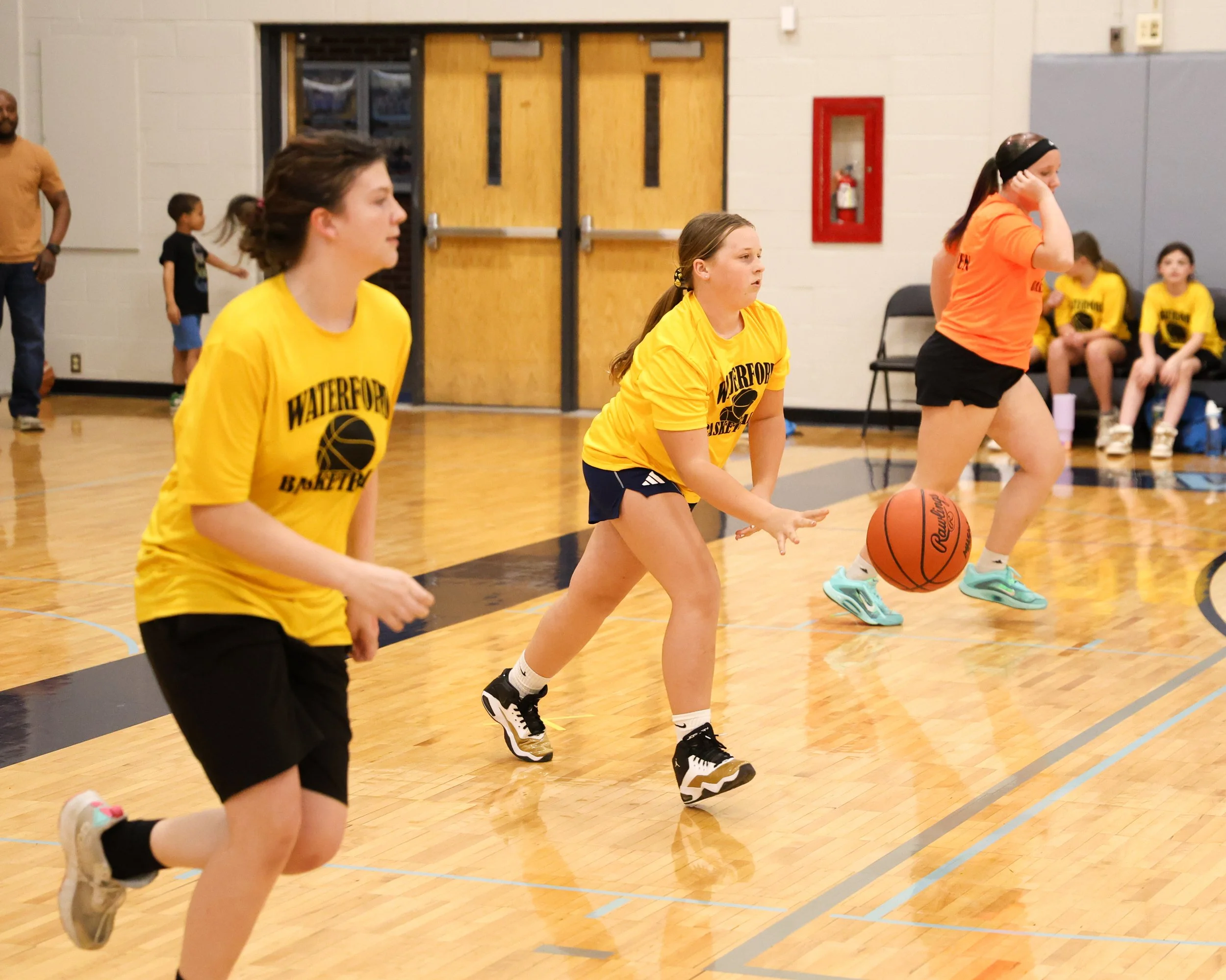 Schoolcraft girl dribbles the ball