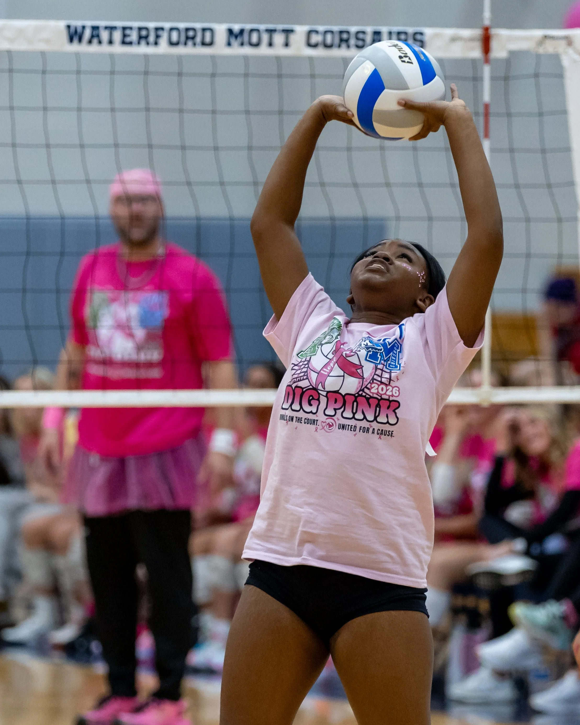 Mott player sets the ball
