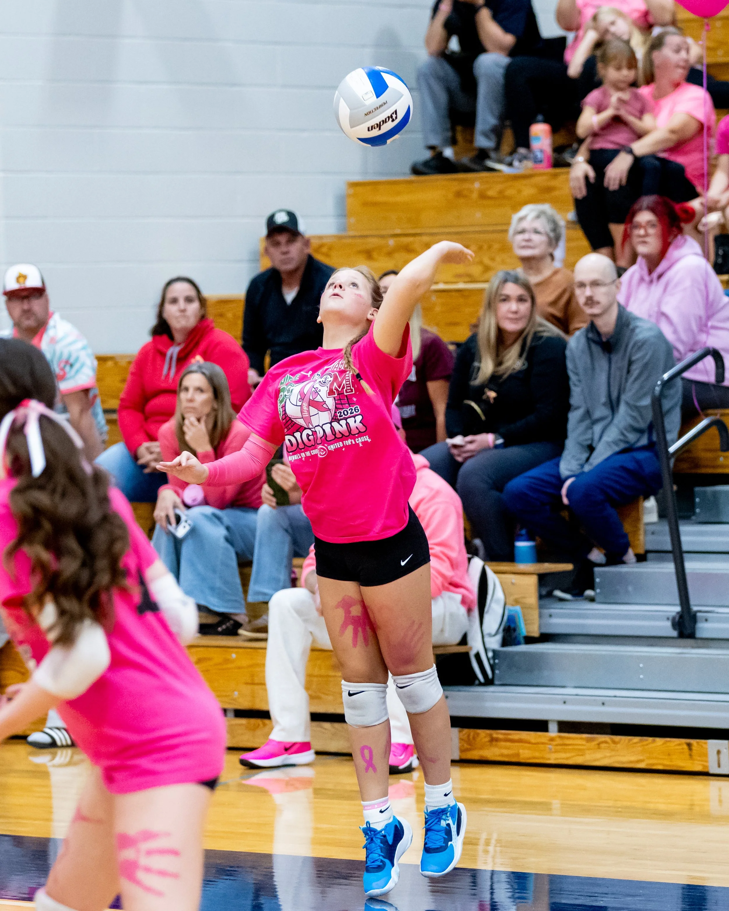 Pierce player serves the ball