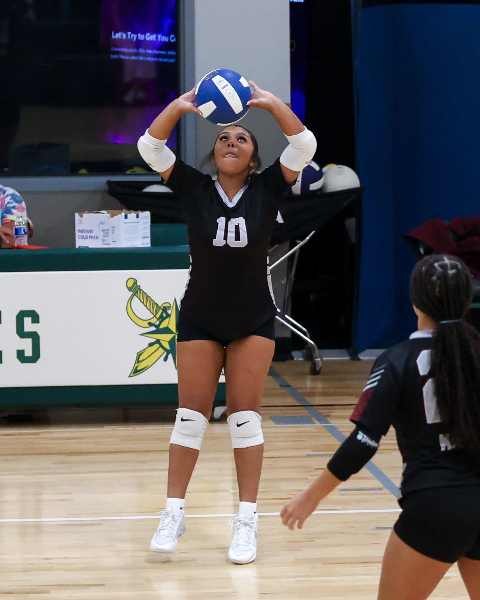 Mason girl returns the ball