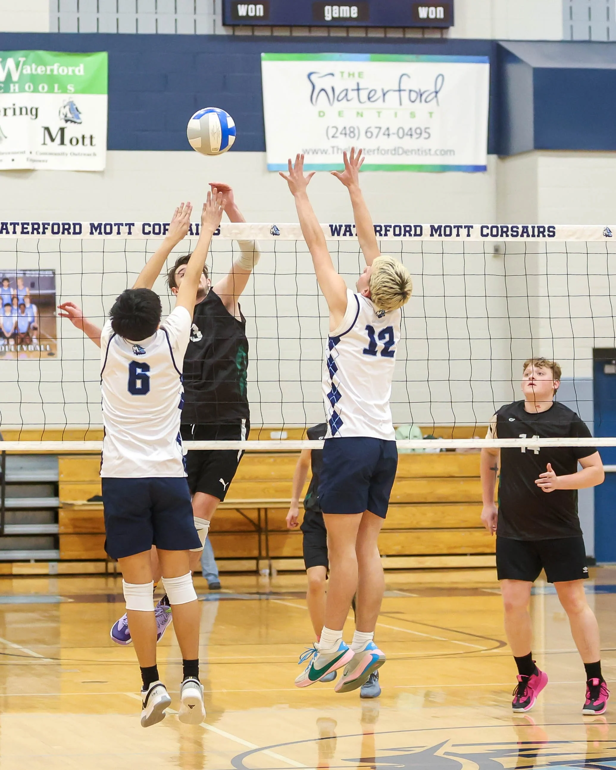 Kettering #3 spikes the ball