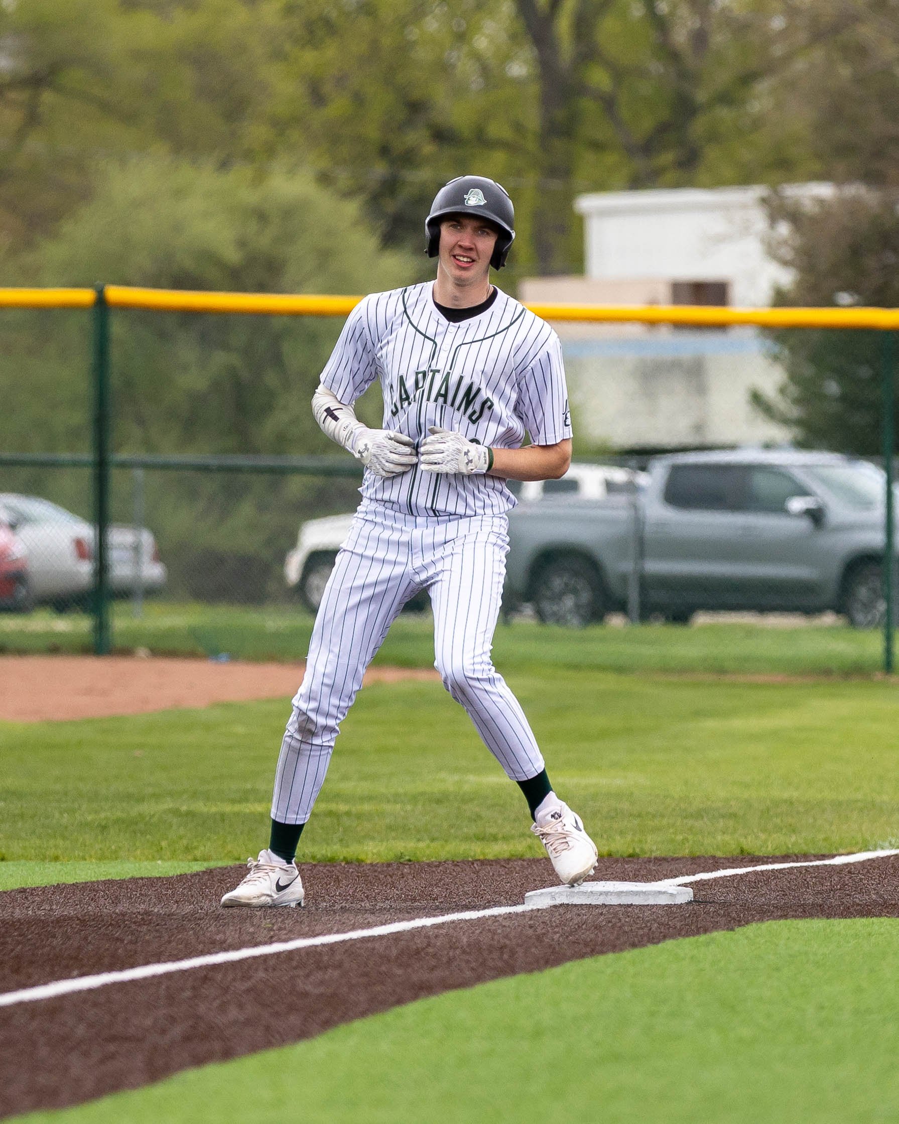 Kettering #18 stands on 3rd base