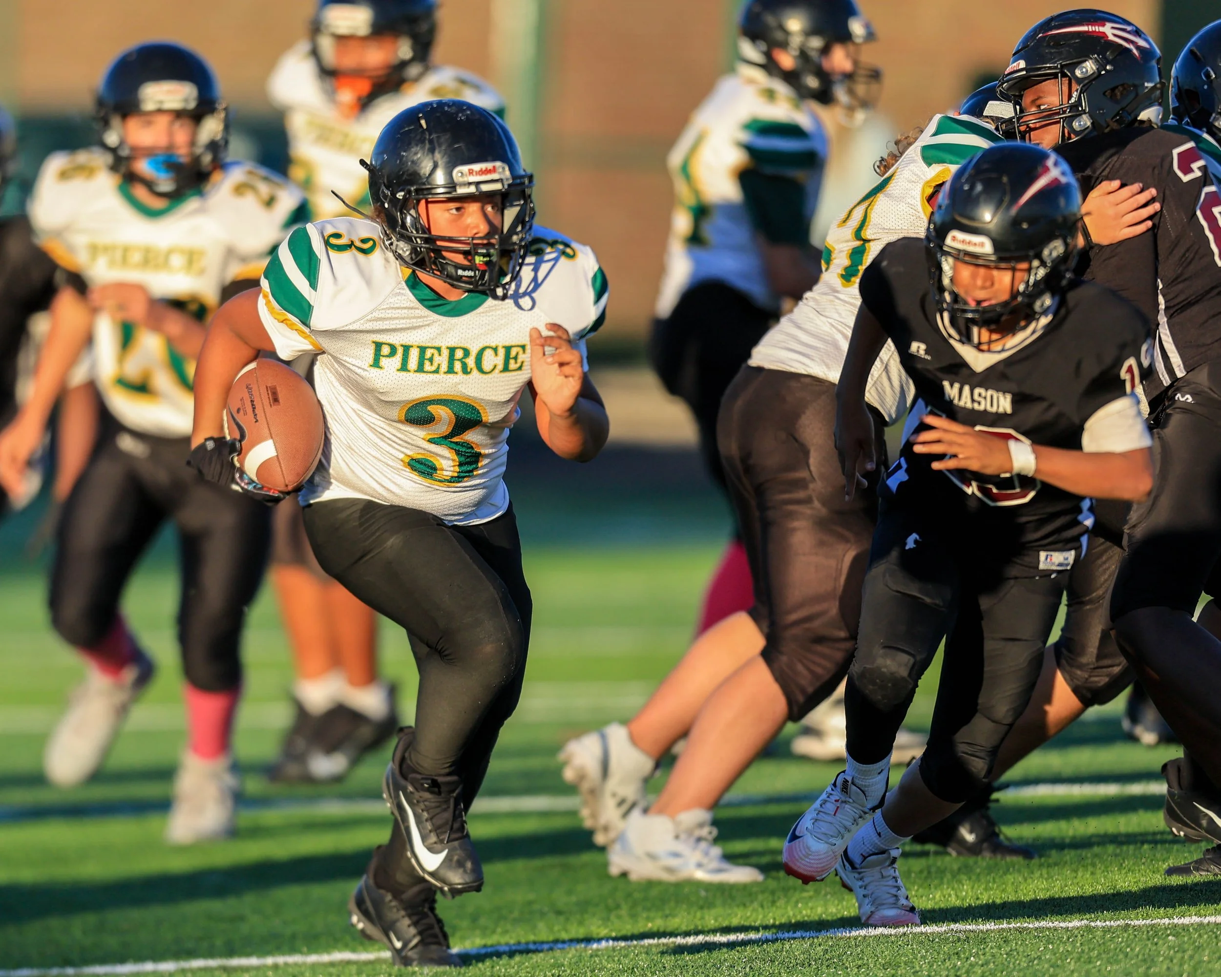 Pierce #3 running with the ball