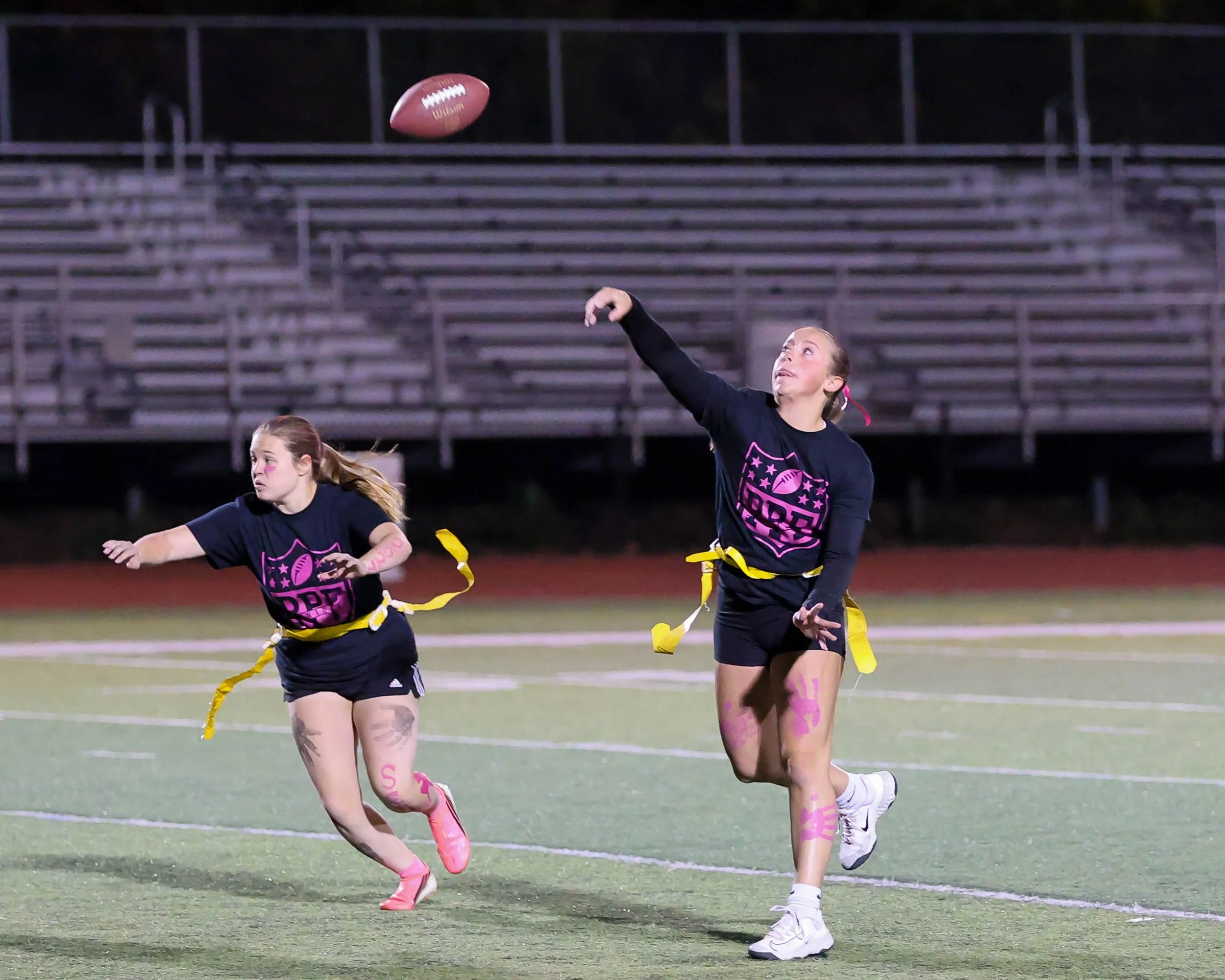 Senior quarterback passes the ball
