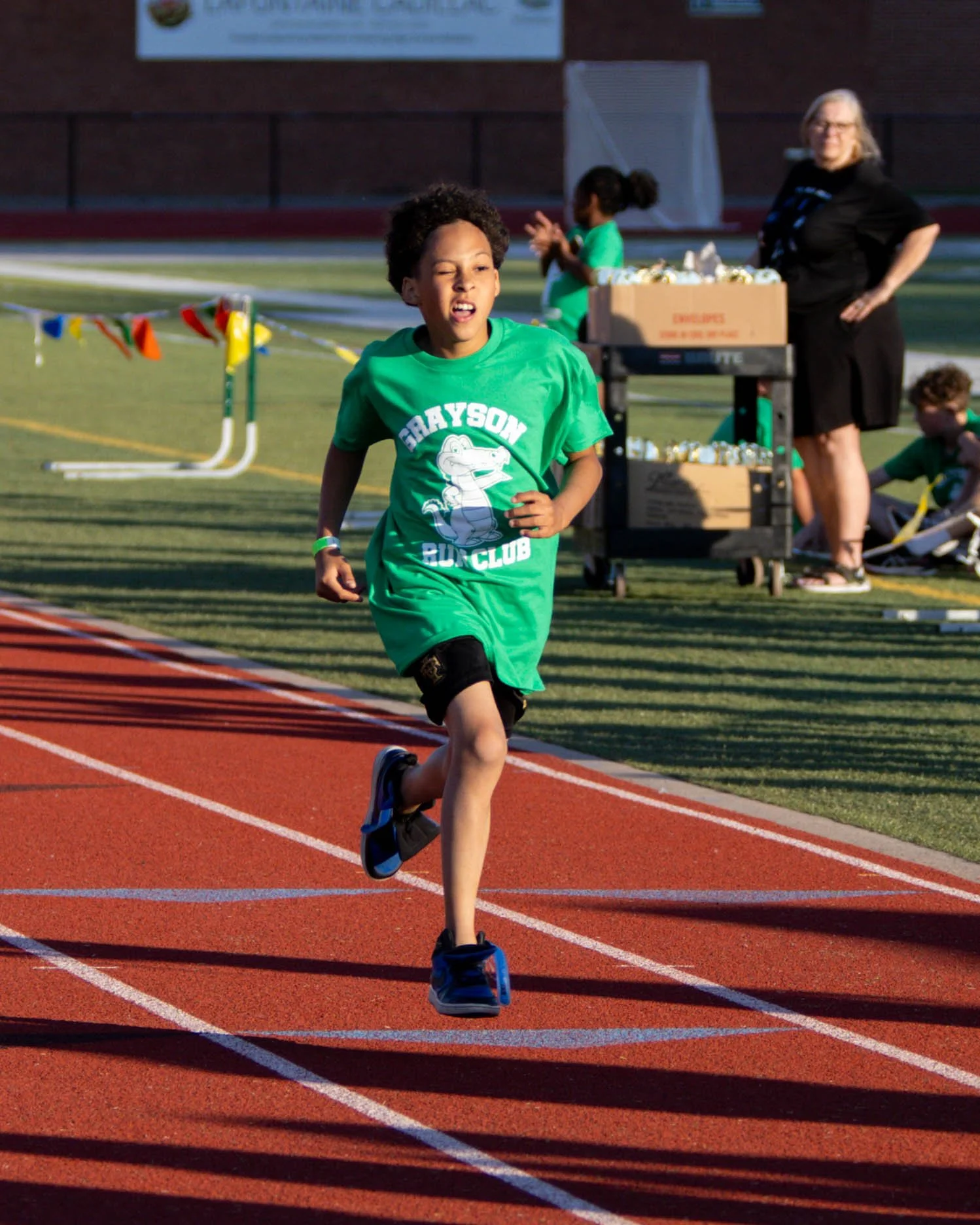 Grayson runner at the finish line