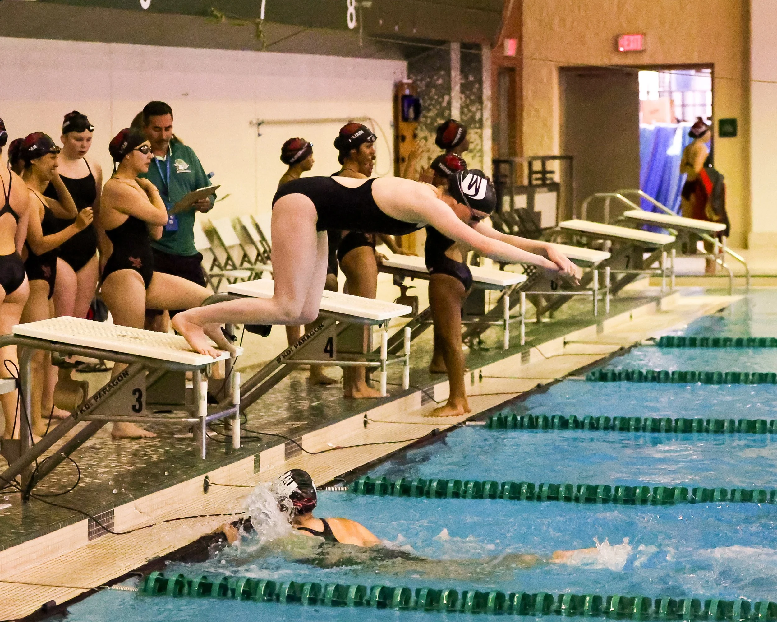 WU swimmer doing the backstroke