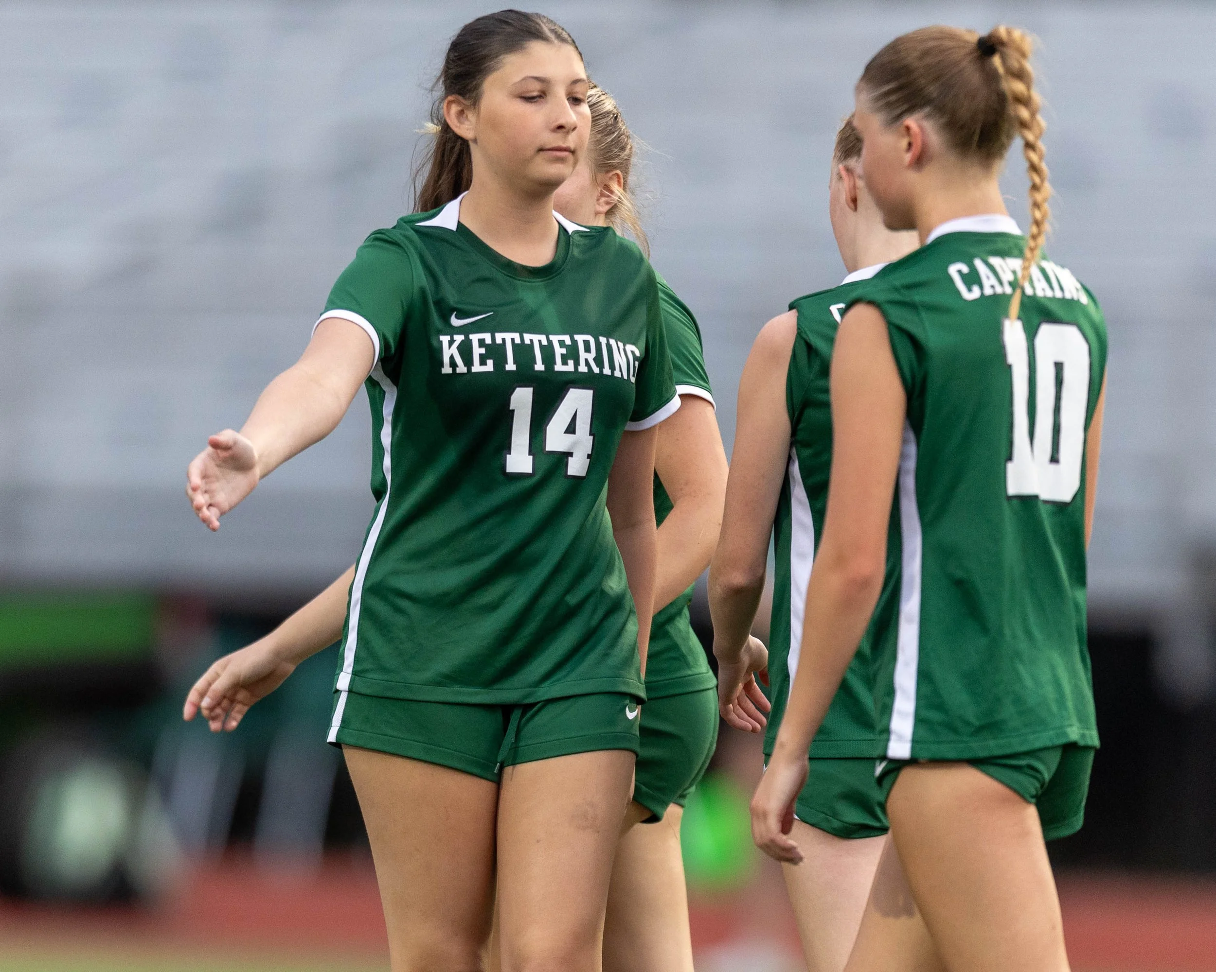 #14 and #10 celebrate the goal