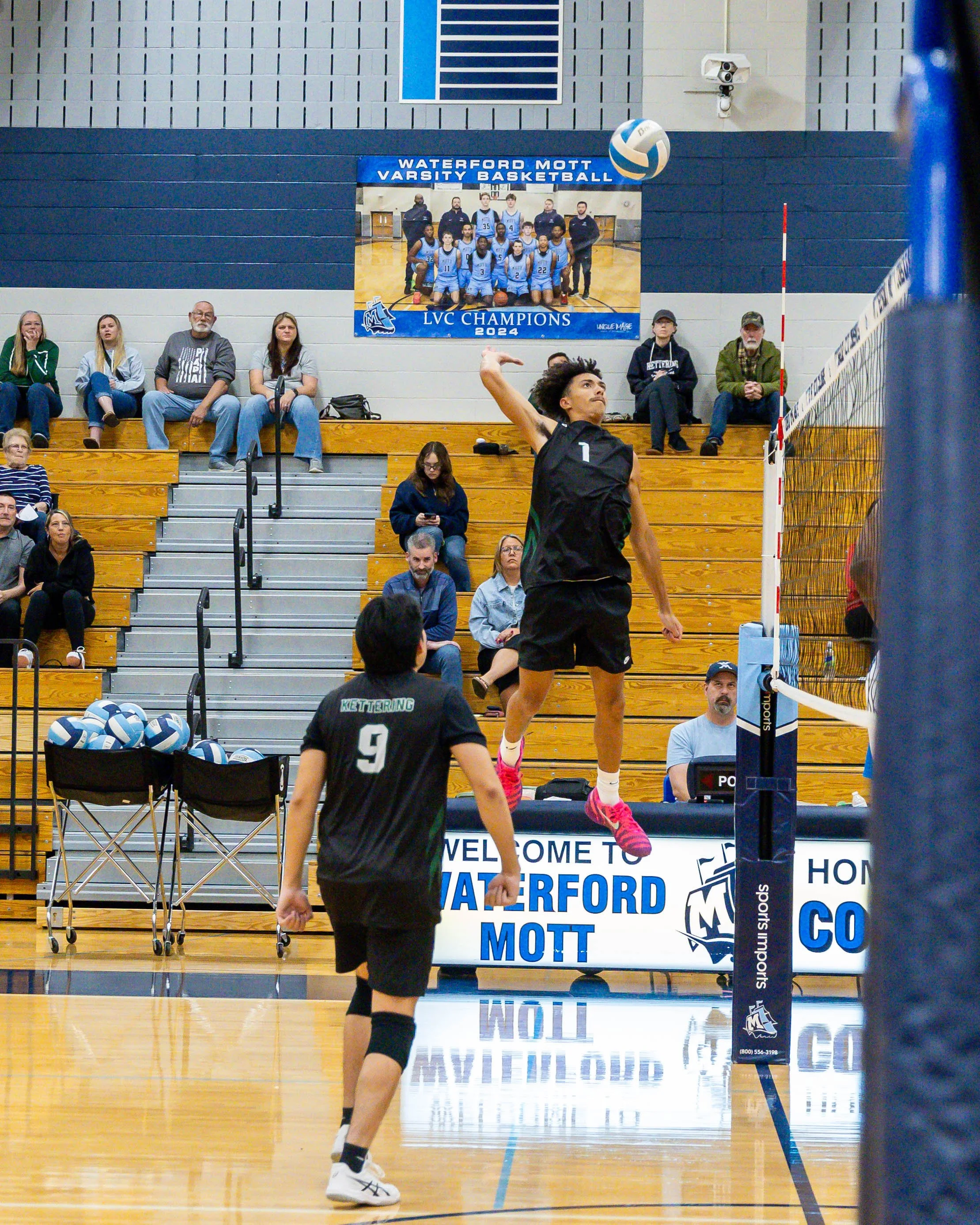 Kettering #1 spikes the ball