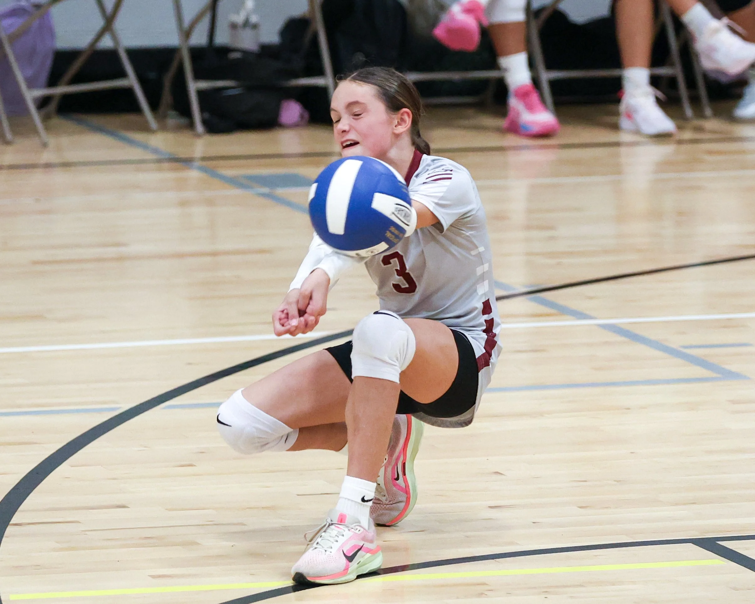 Mason girl returns the ball