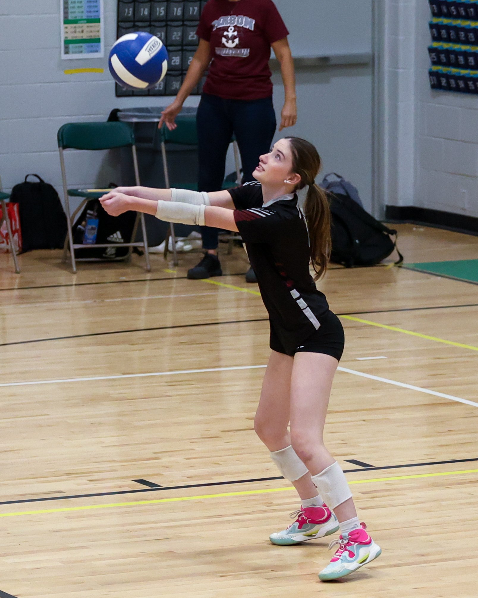 Mason girl returns the ball