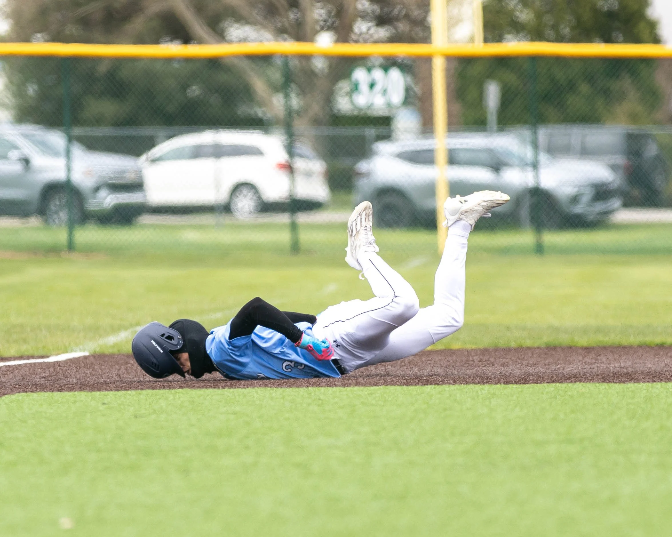 Mott #3 slides short into 3rd base