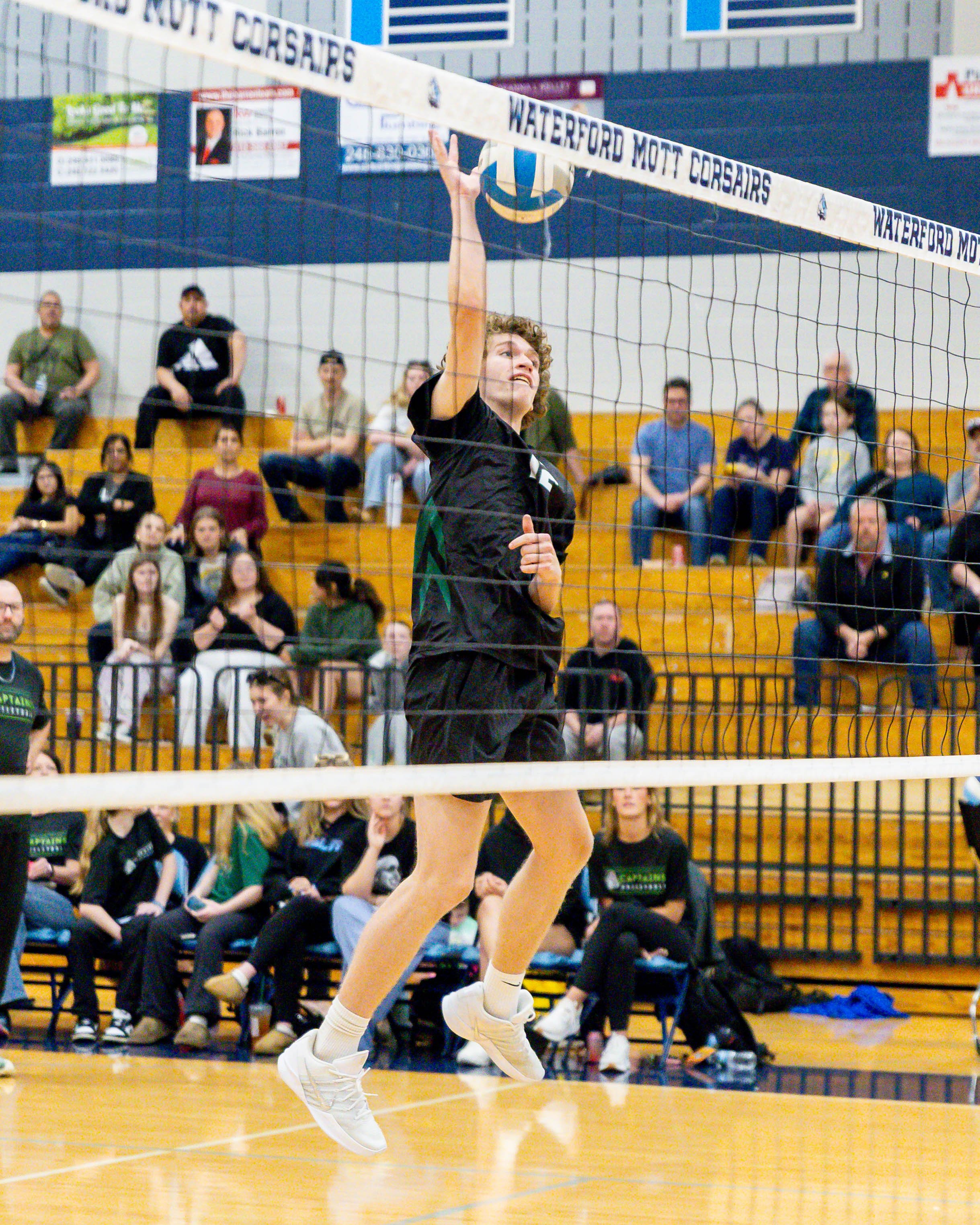 Kettering #12 returns the ball