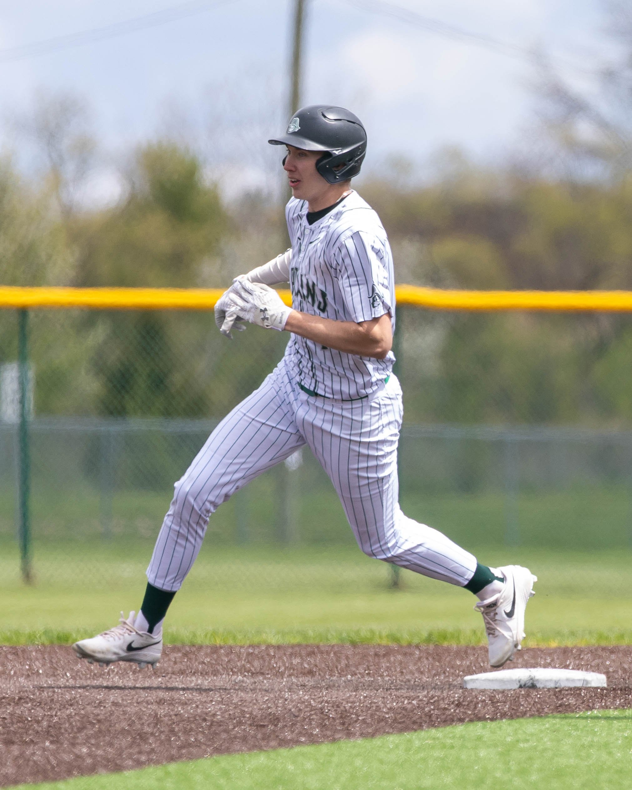 Kettering runner rounding 2nd base