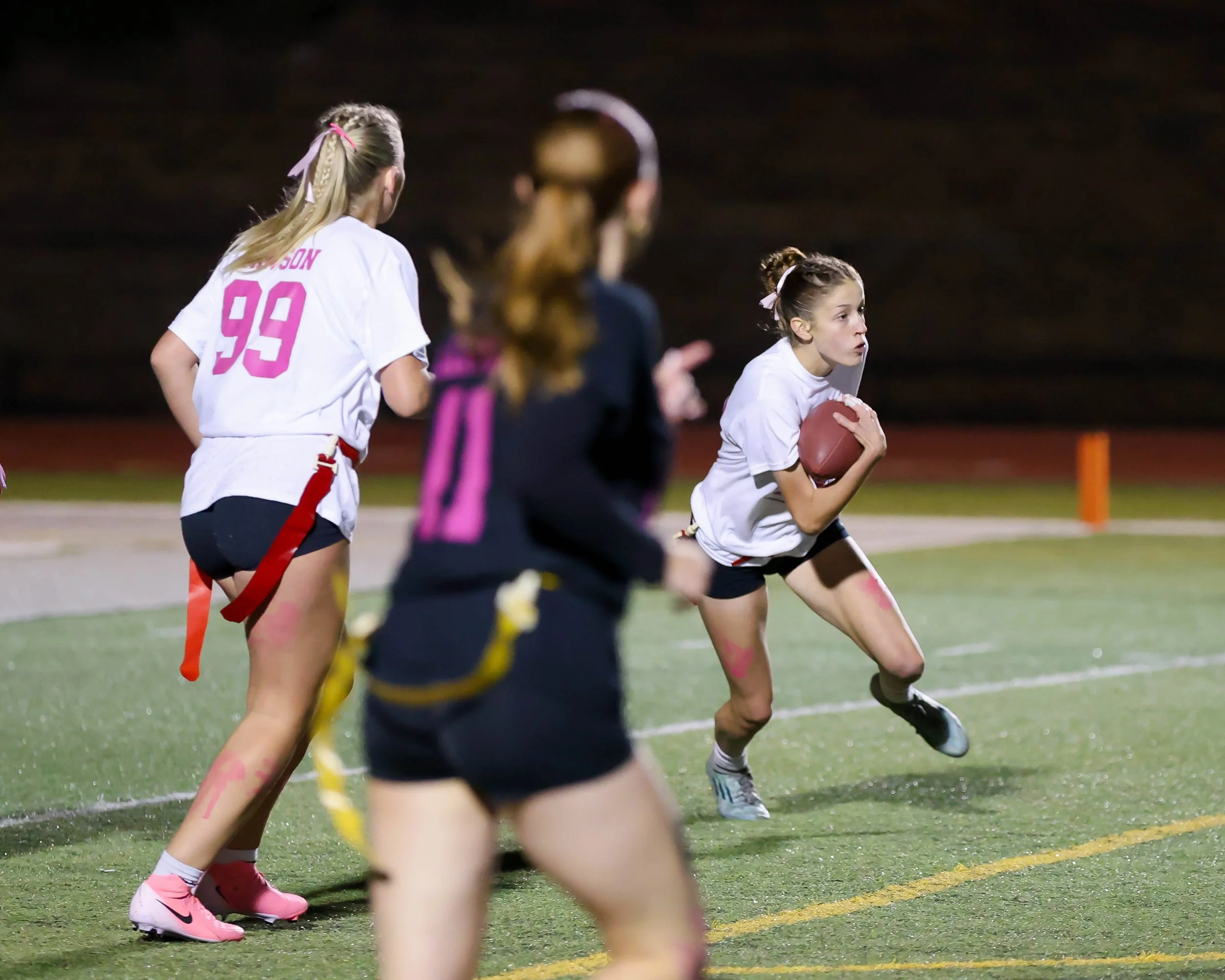 Junior running with the ball