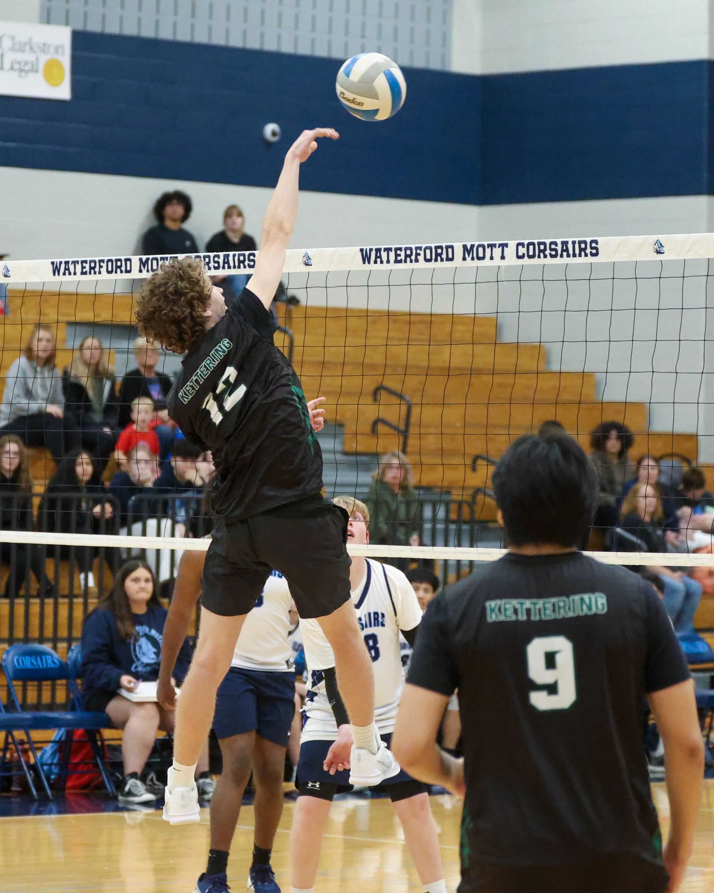 Kettering #12 spikes the ball