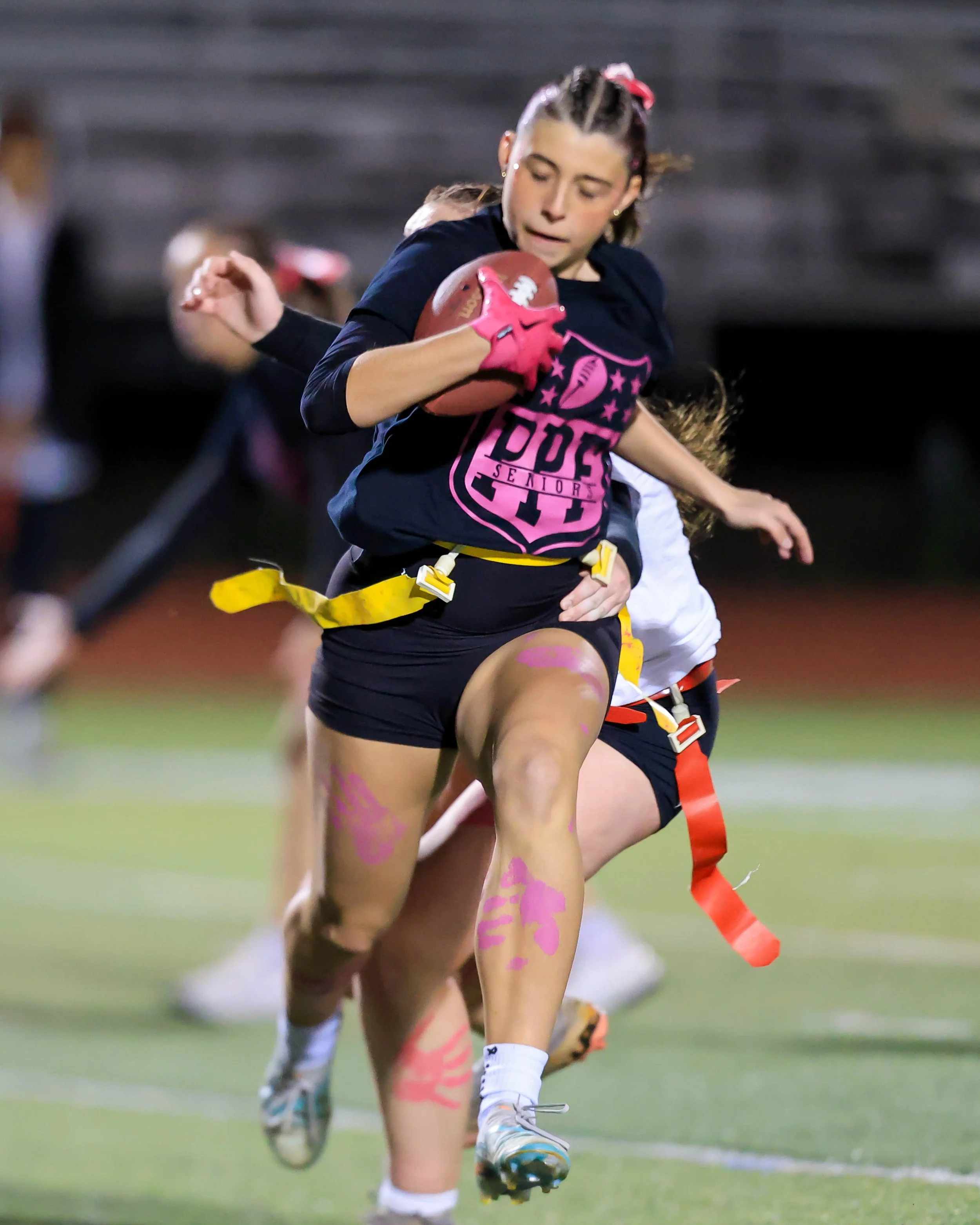 Senior running back carries the ball