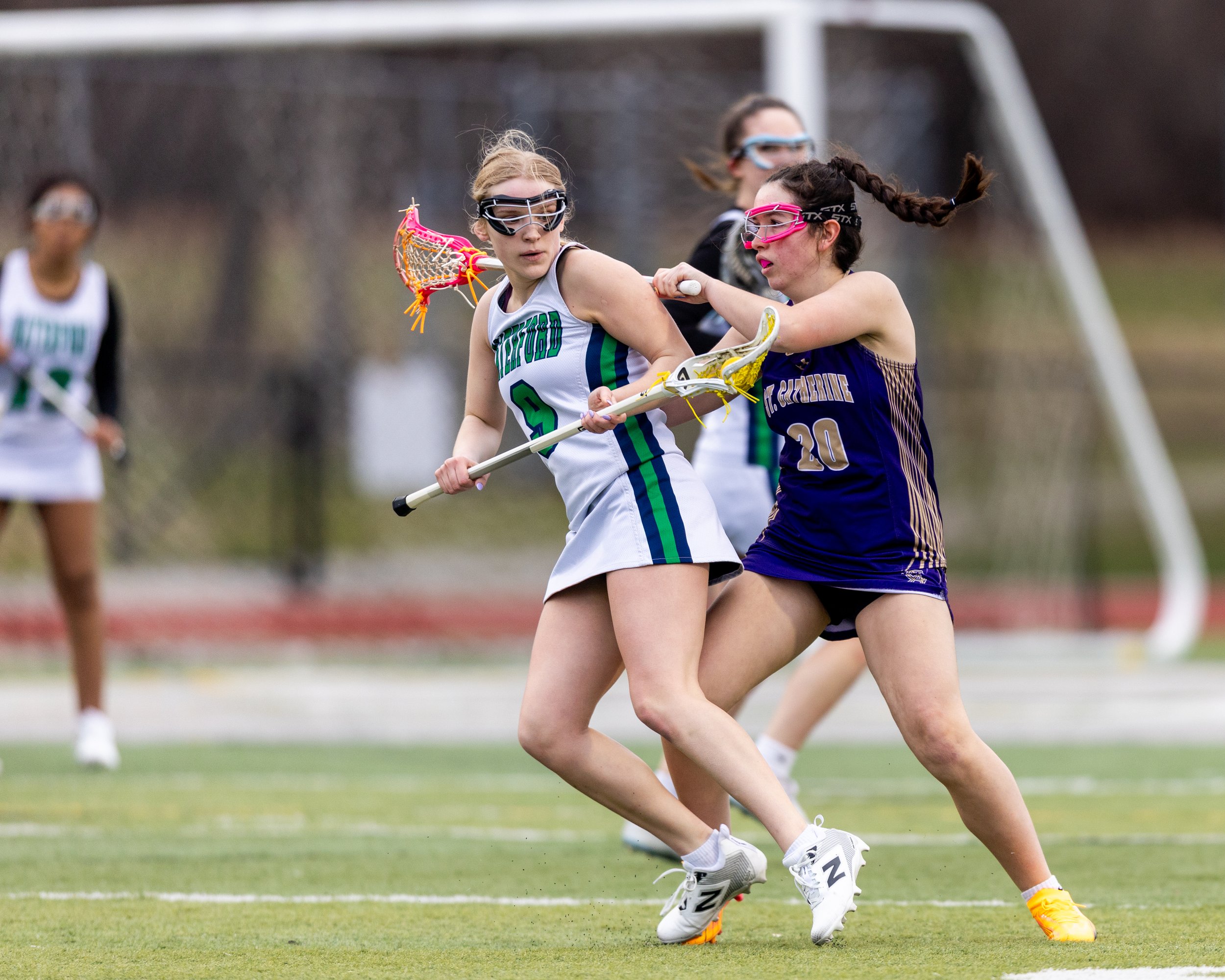 #9 turns with the ball guarded by SC #20