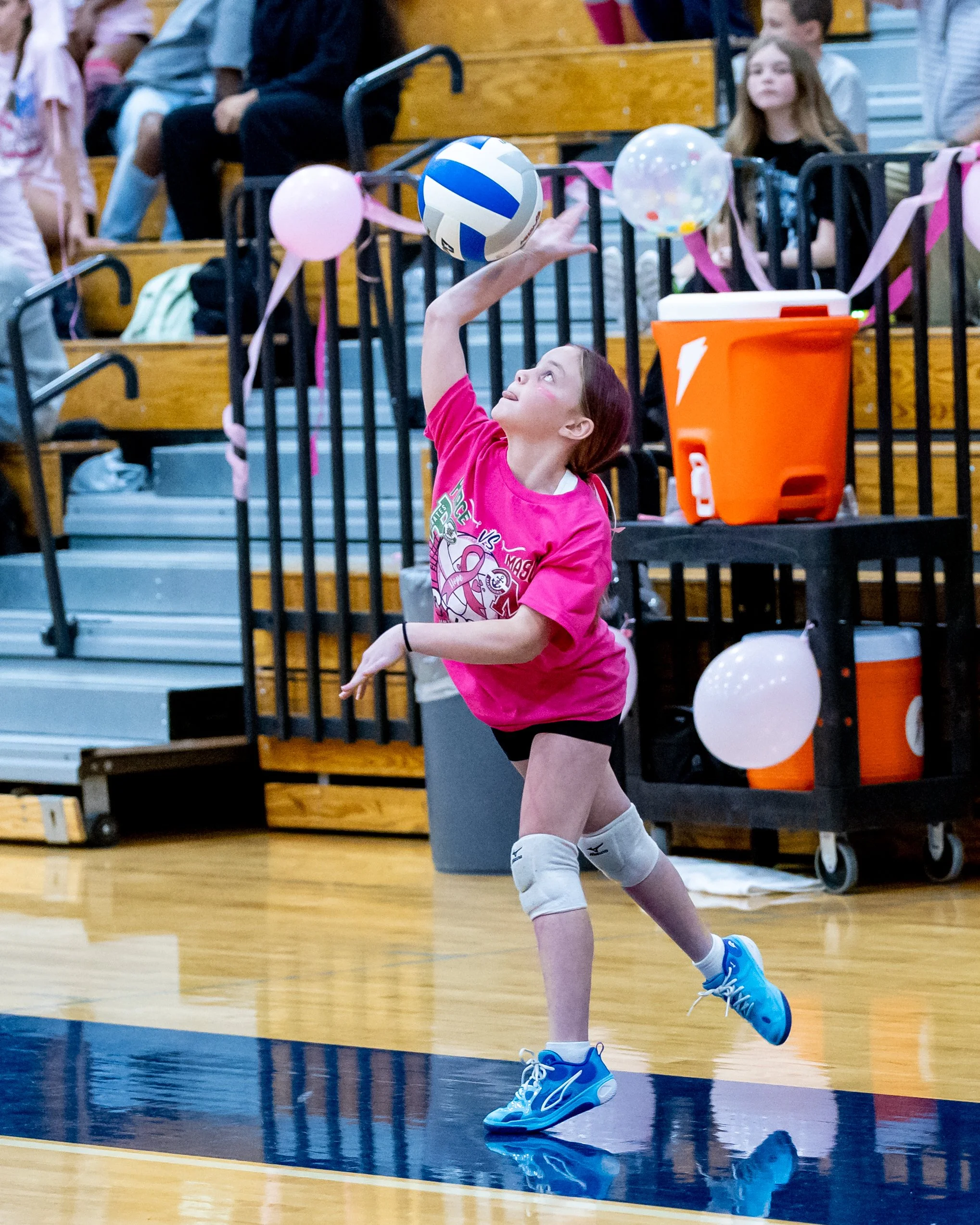 Pierce player serves the ball