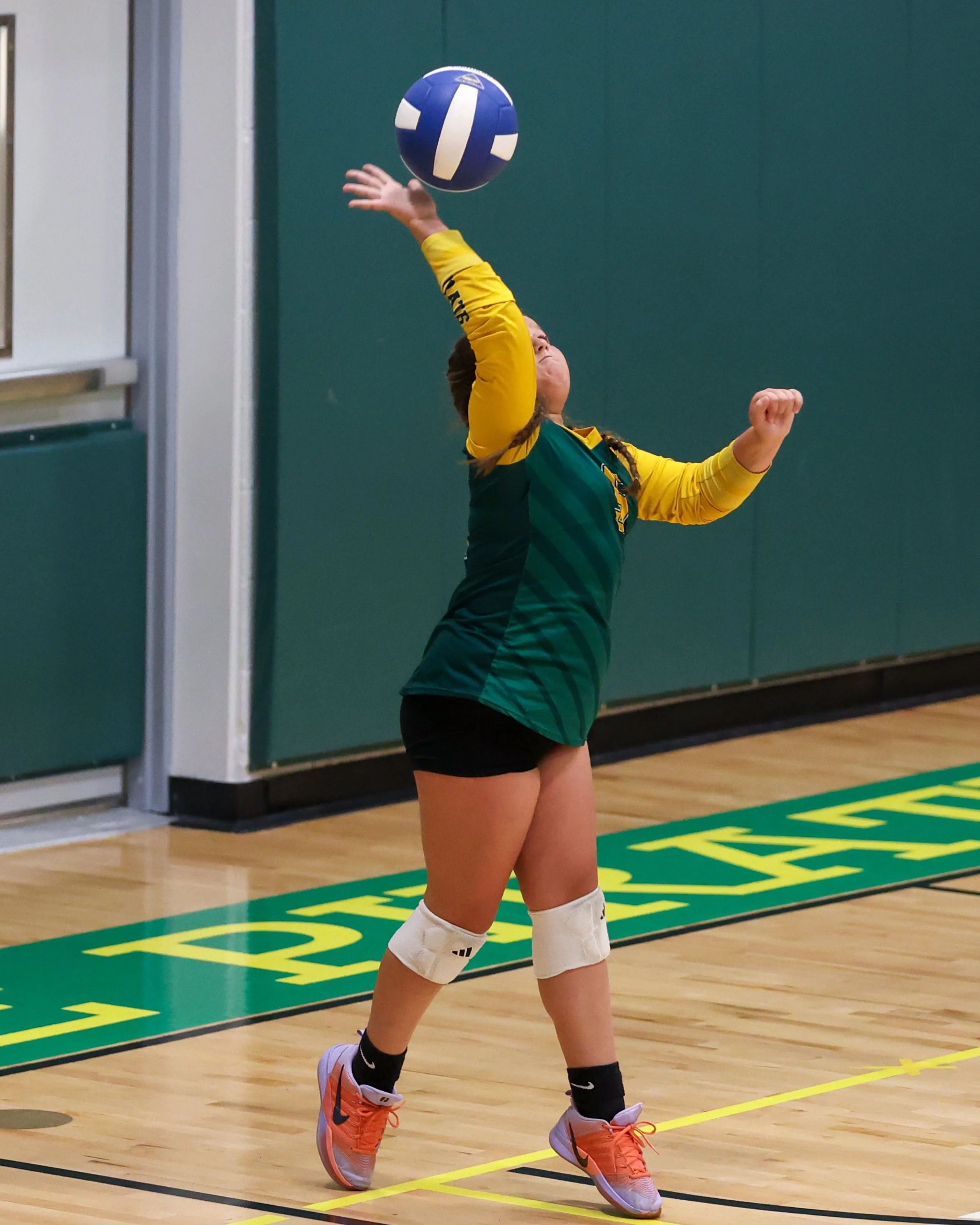Pierce serves the ball