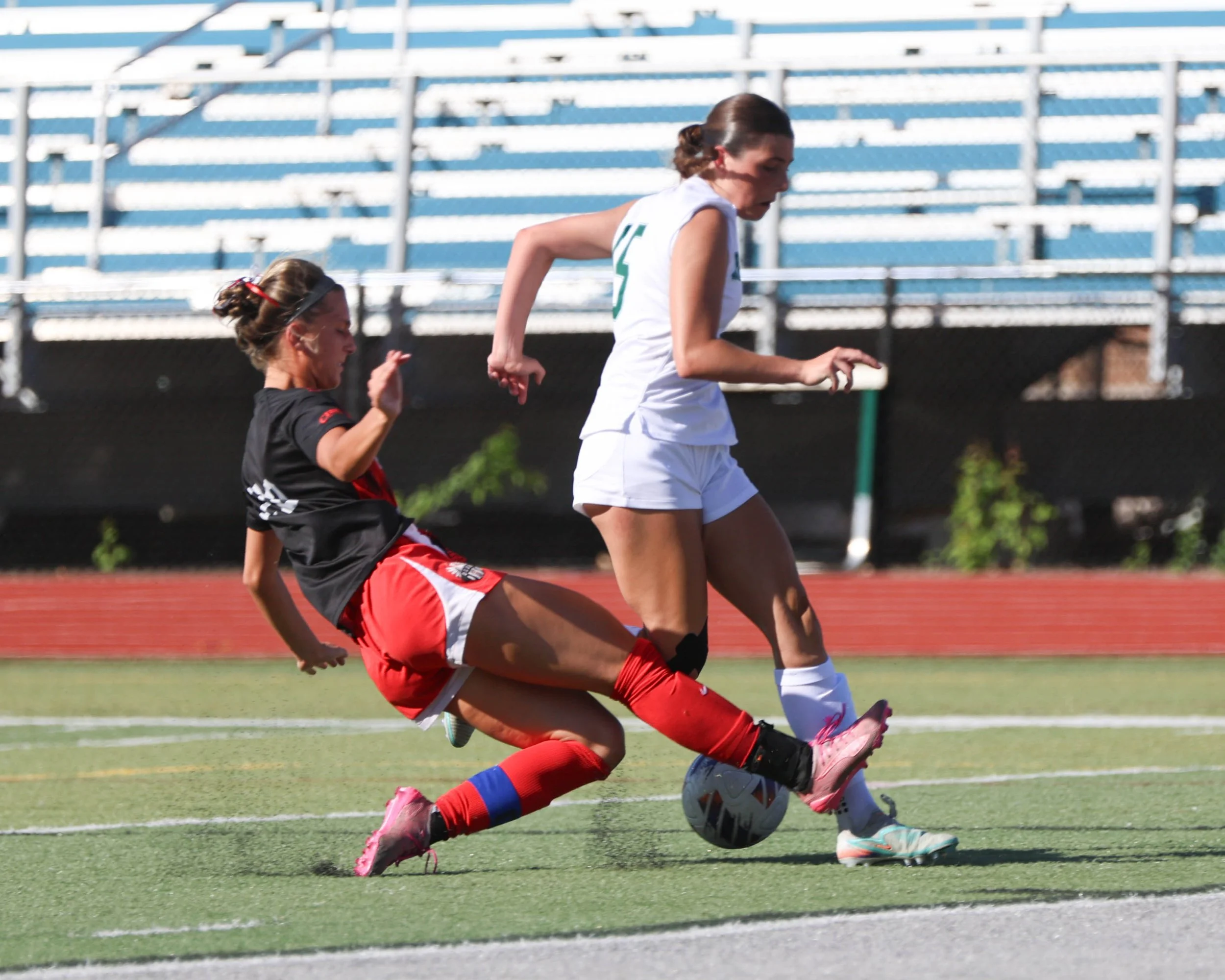#15 goes past a defender
