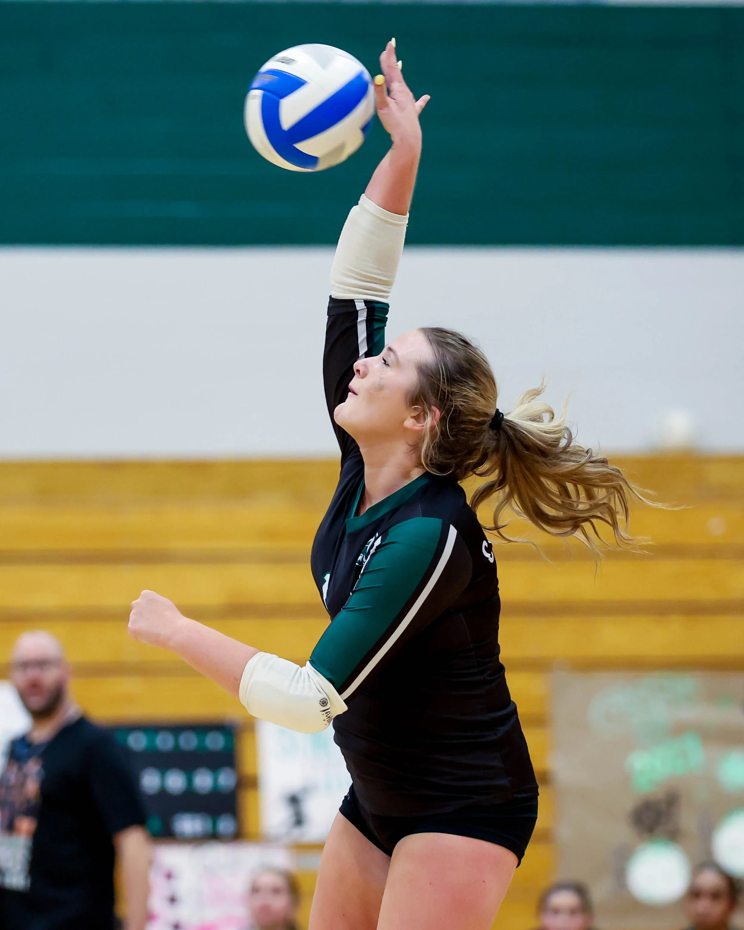 Kettering #1 hits the ball