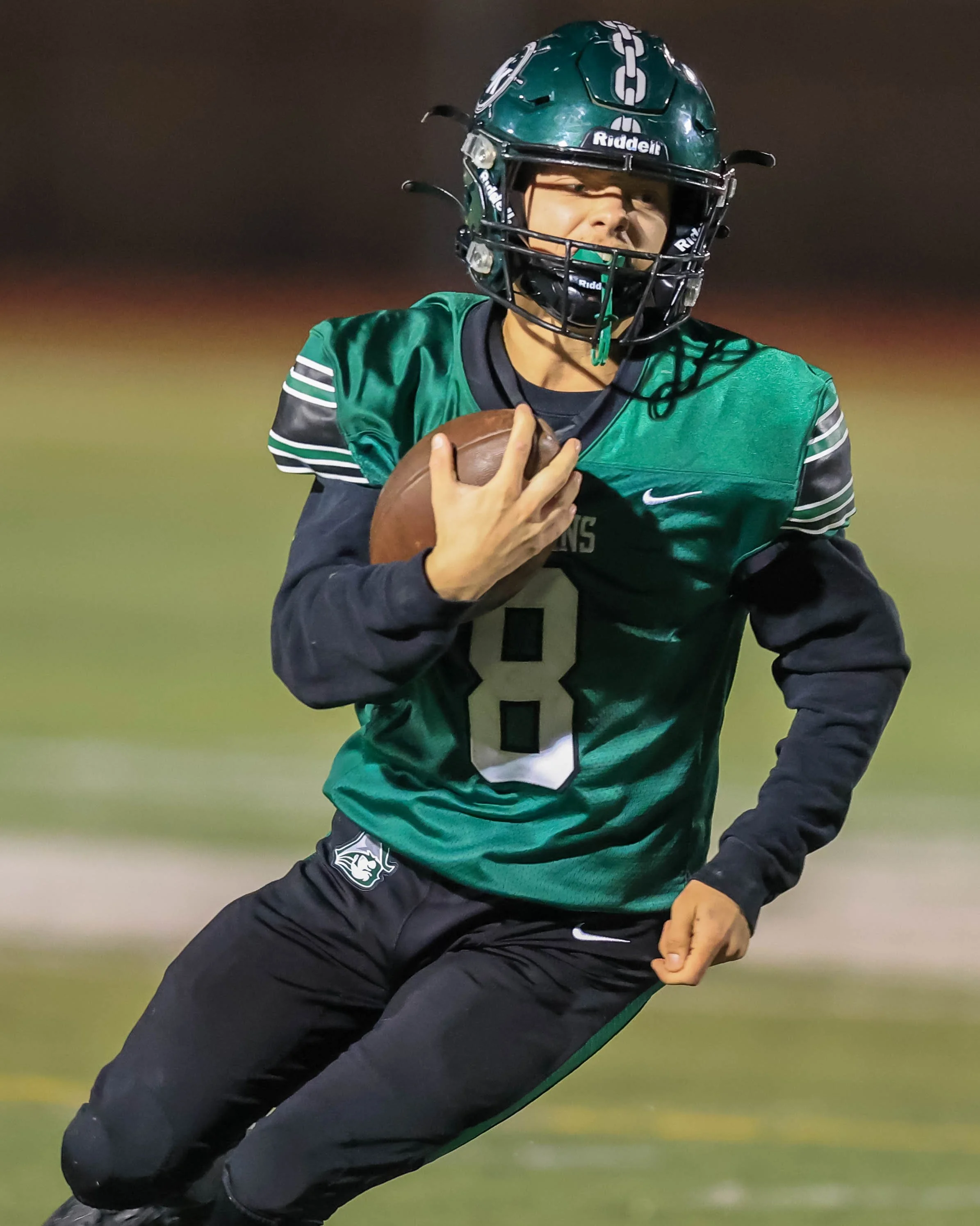 WK #8 carries the ball