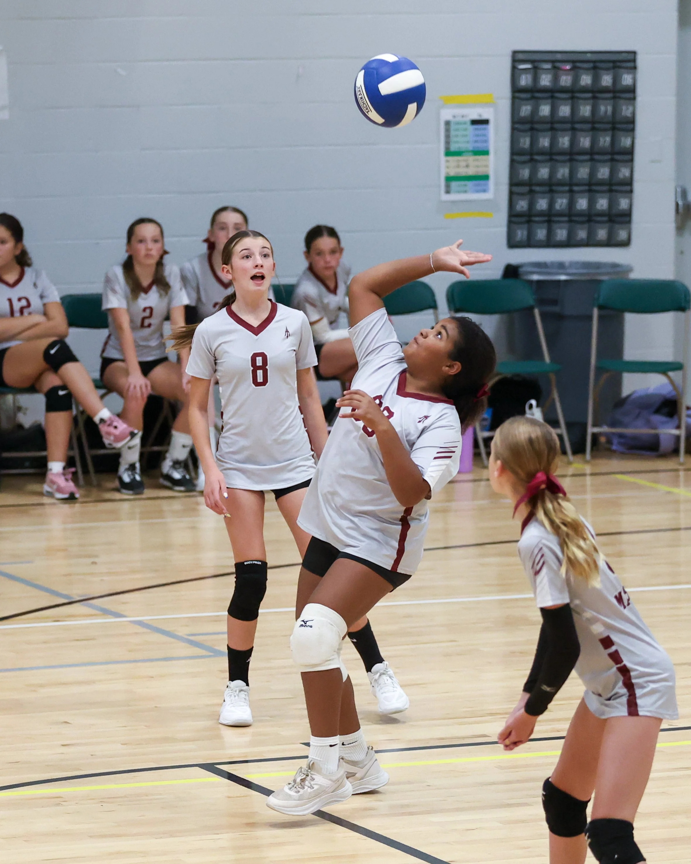 Mason girl returns the ball