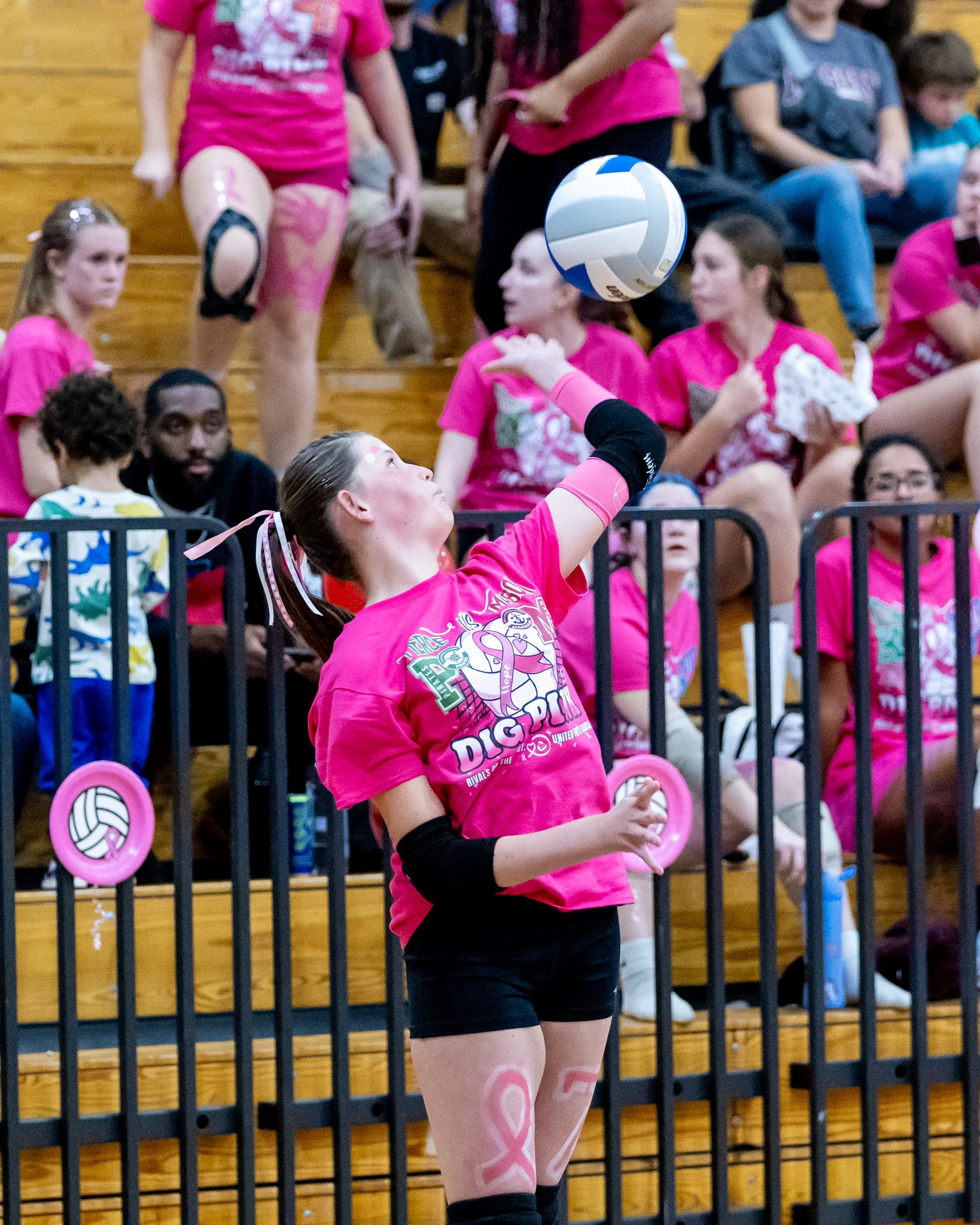 Pierce player serves the ball