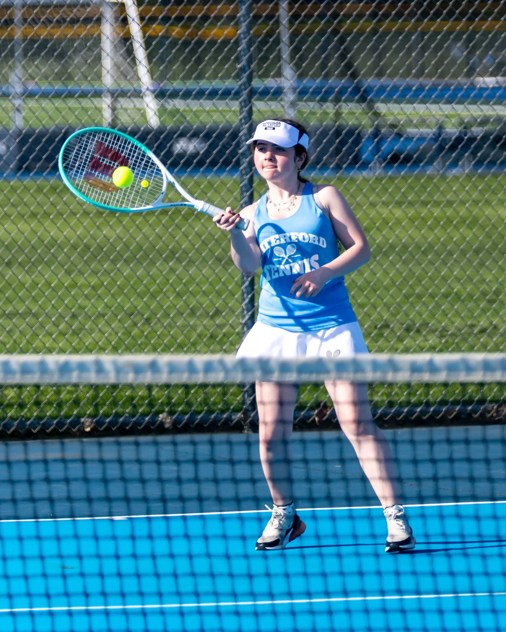 Waterford United player returns the ball