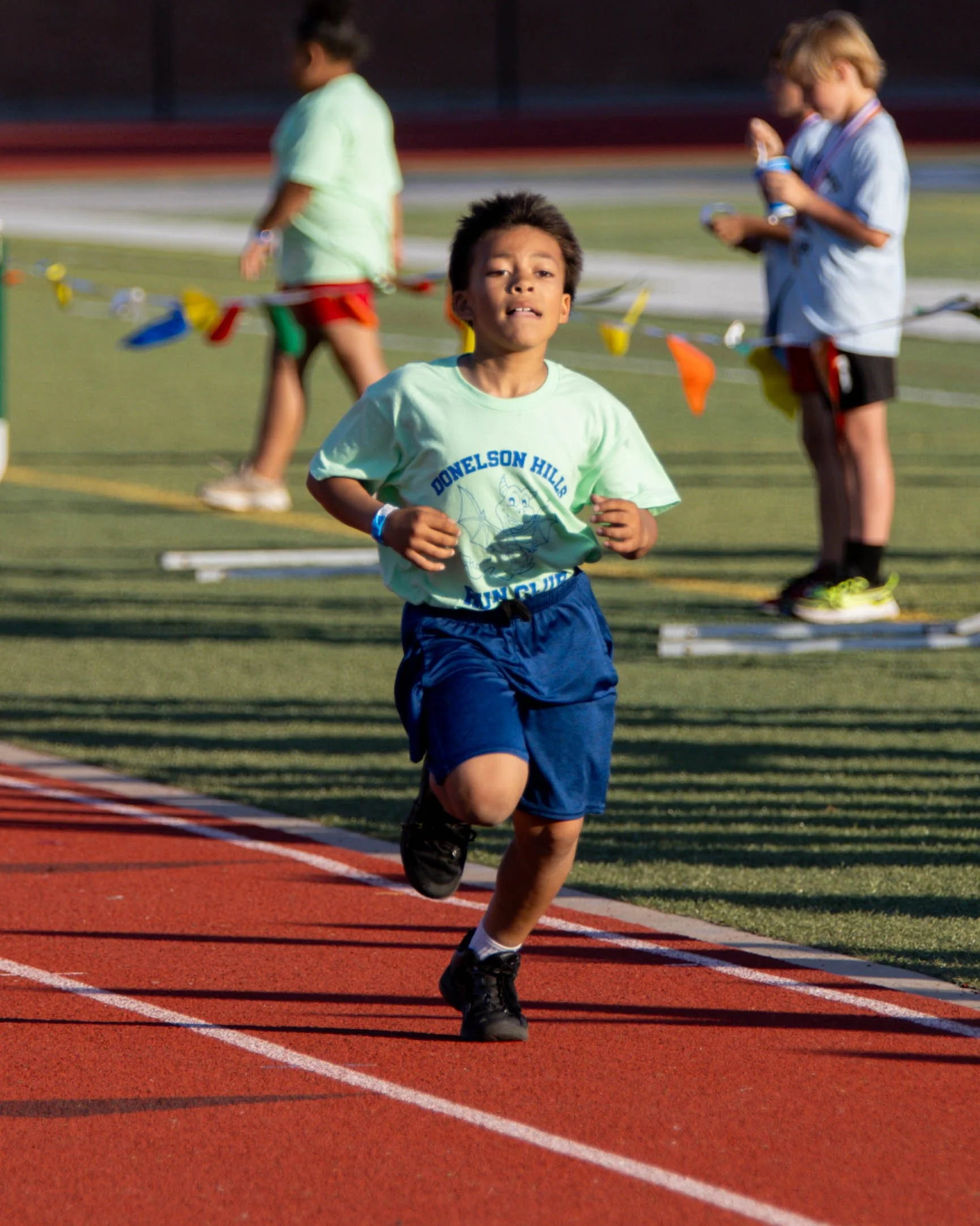Donelson Hills runner at the finish line