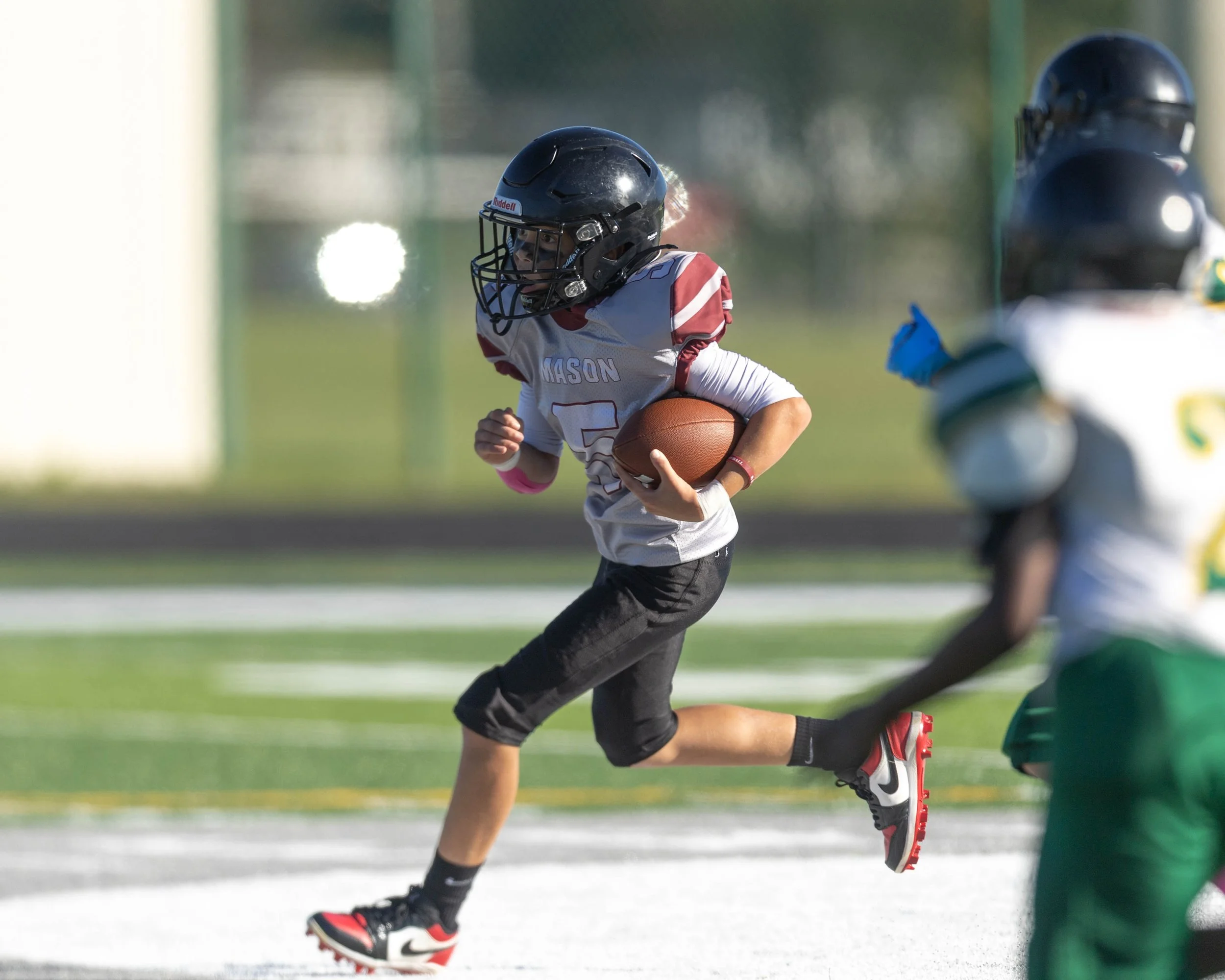 Mason #5 runs around the corner