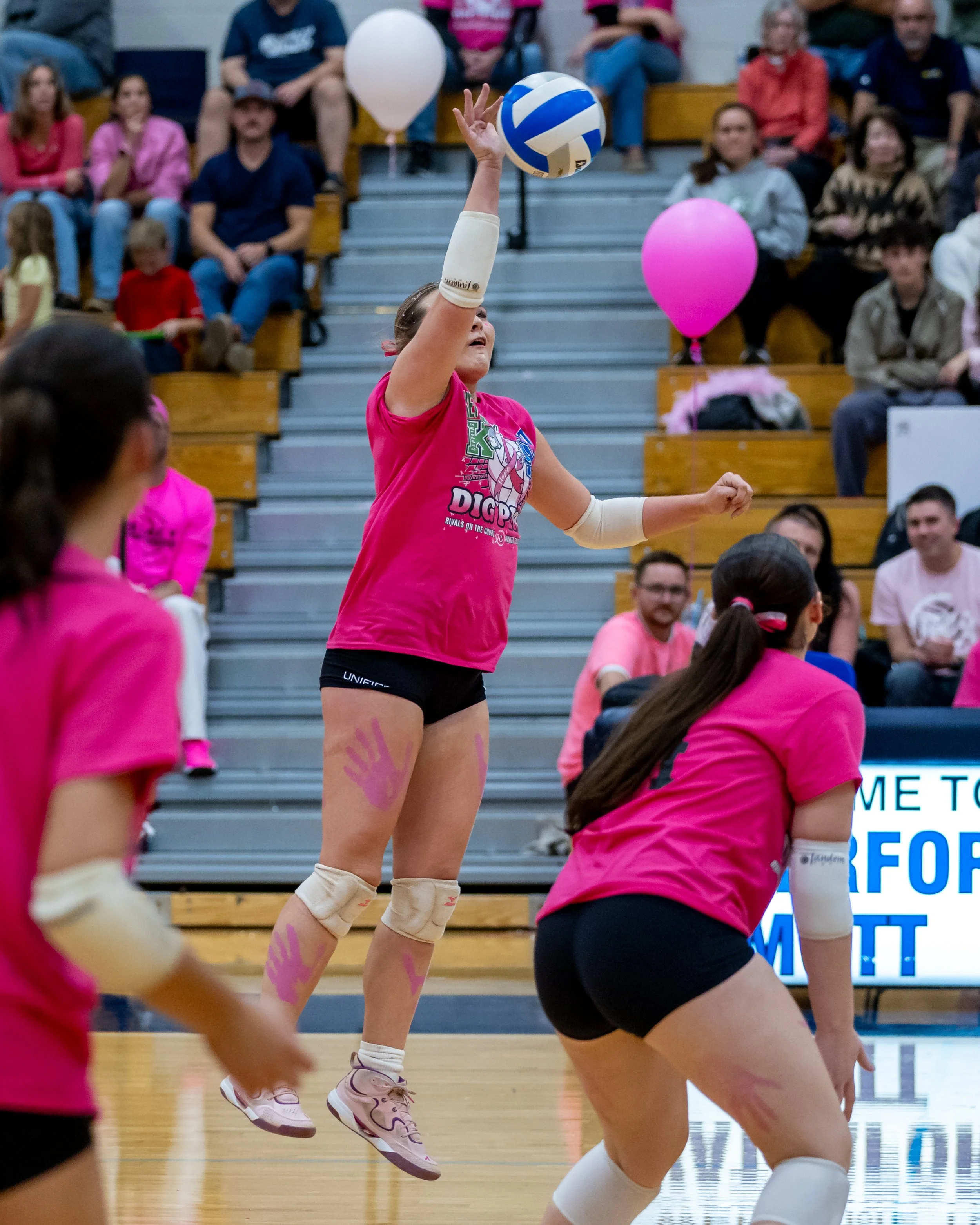 Kettering player hits the ball