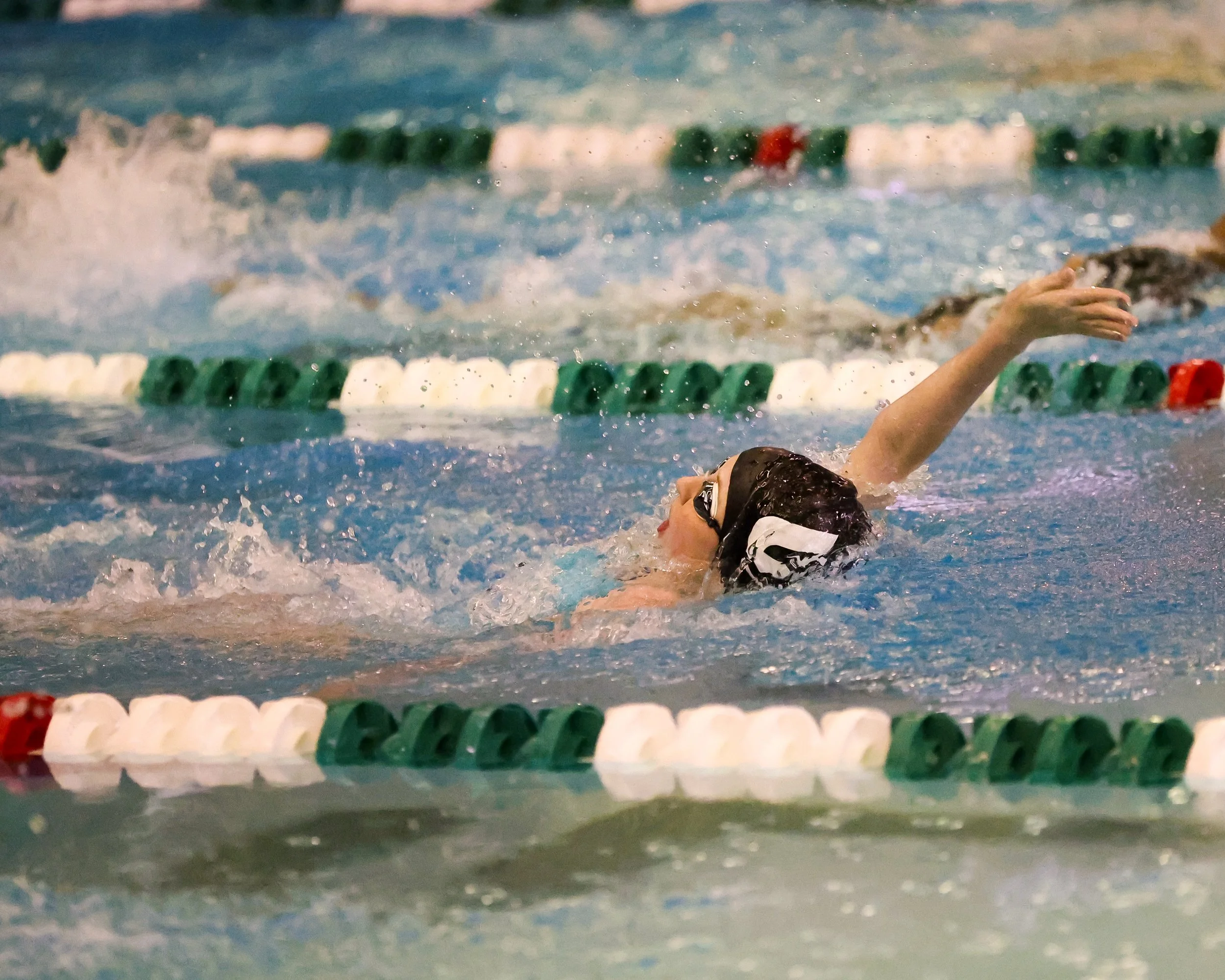 WU swimmer doing the backstroke