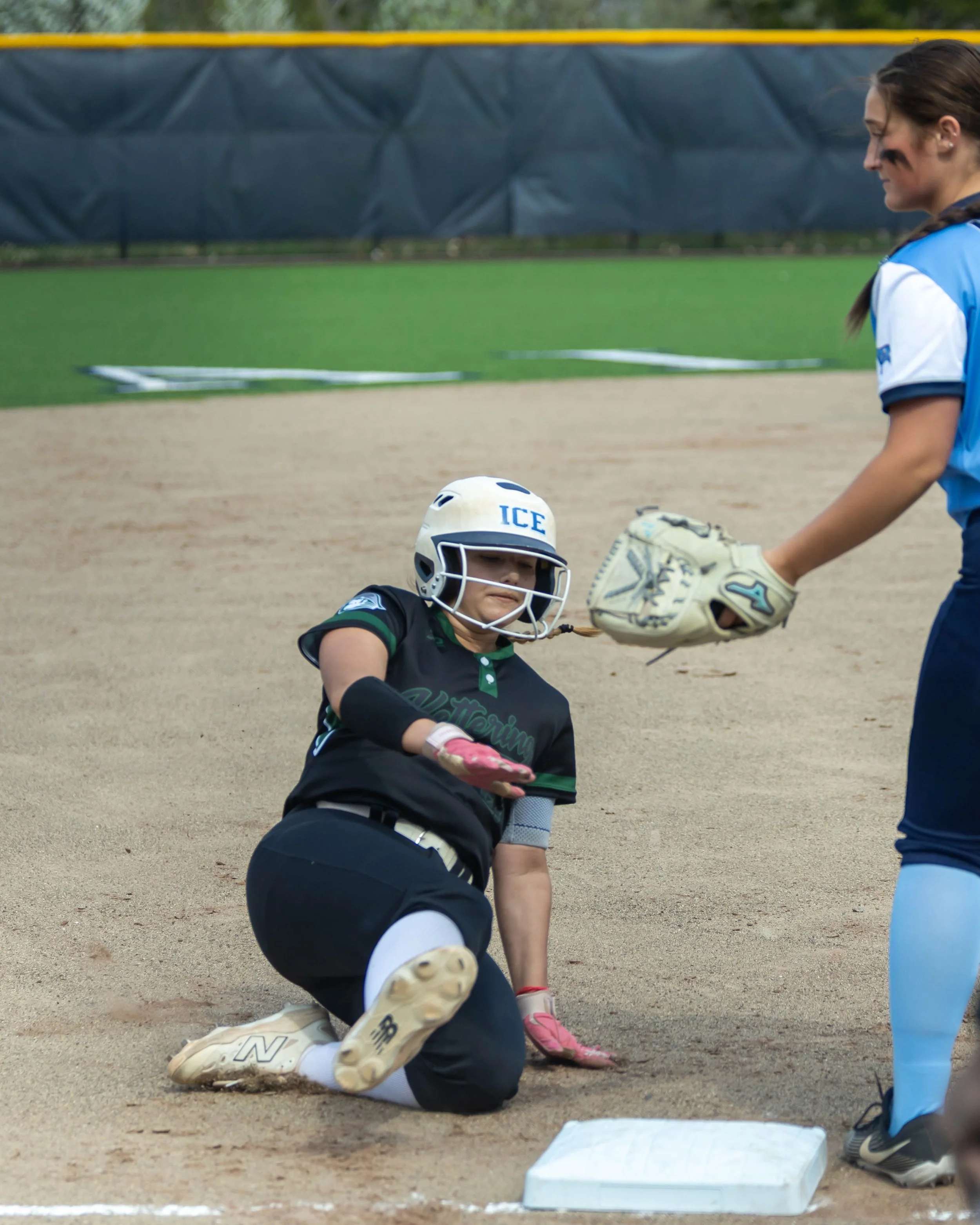 Kettering #27 slides into third base