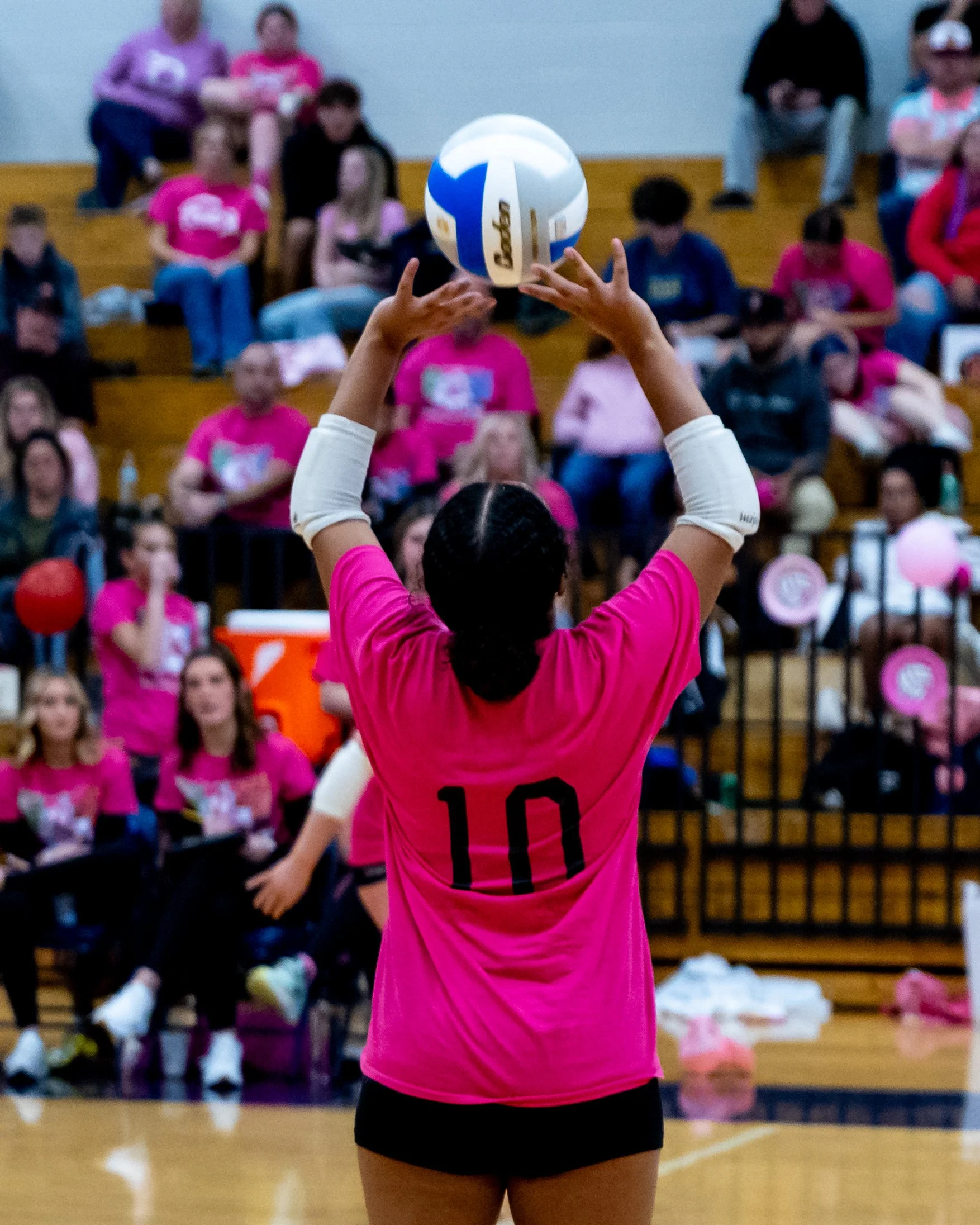 Kettering player hits the ball