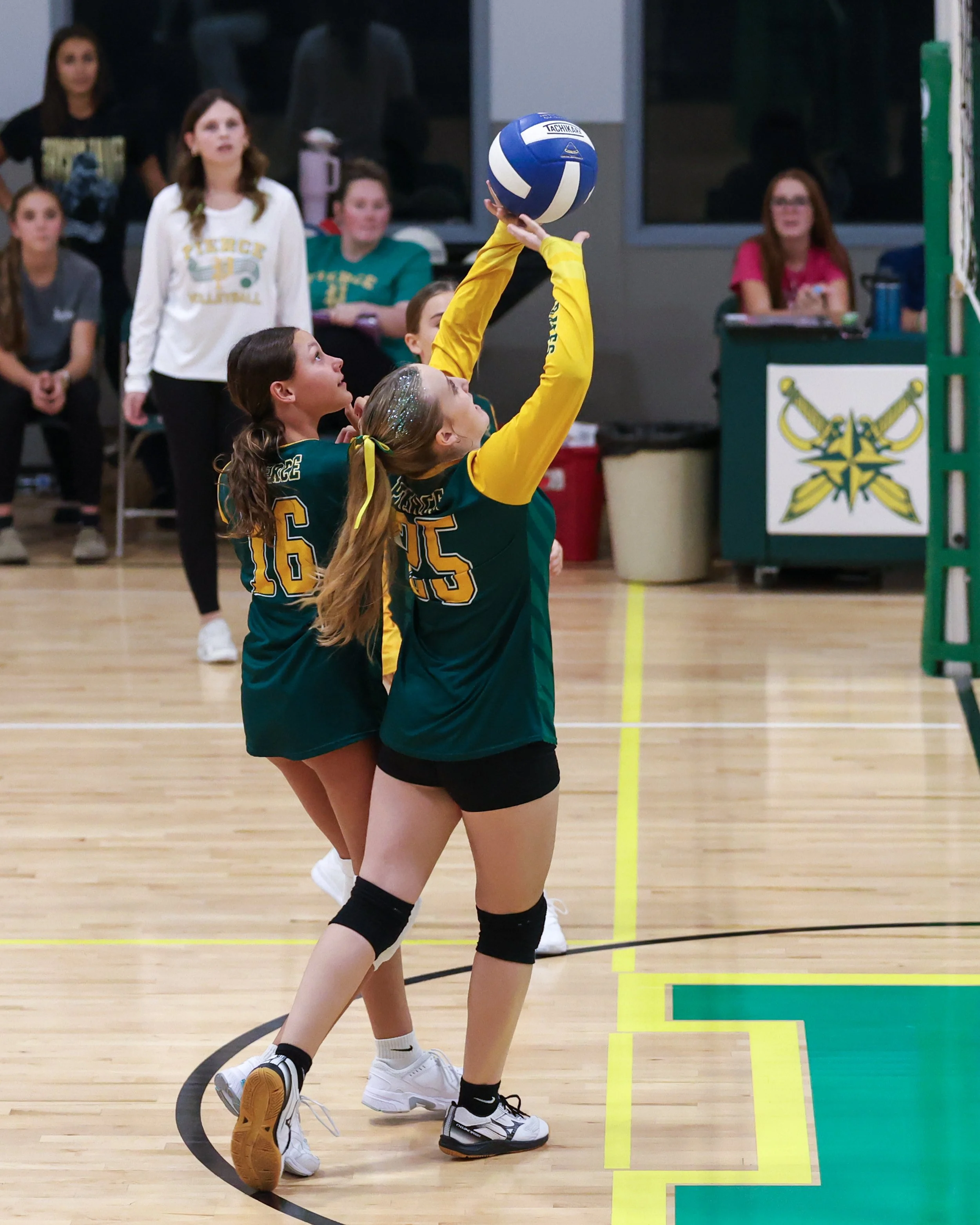 Pierce girls return the ball