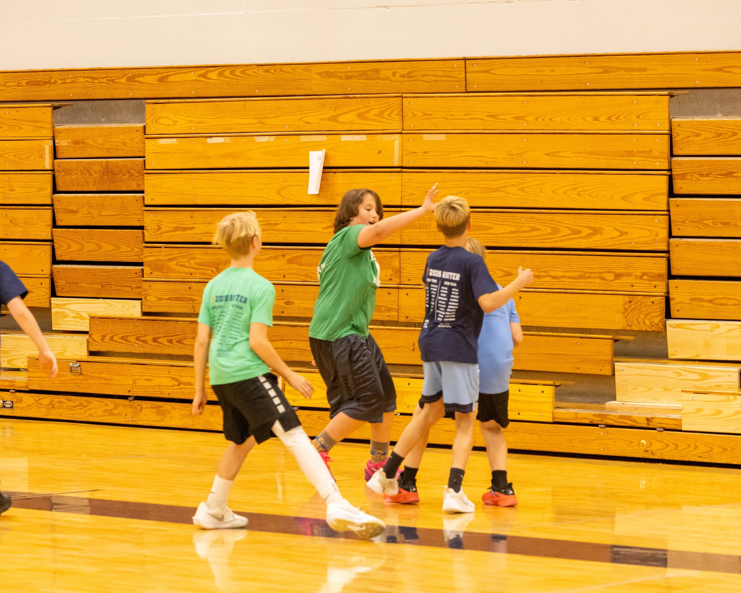 Kids playing basketball in there  