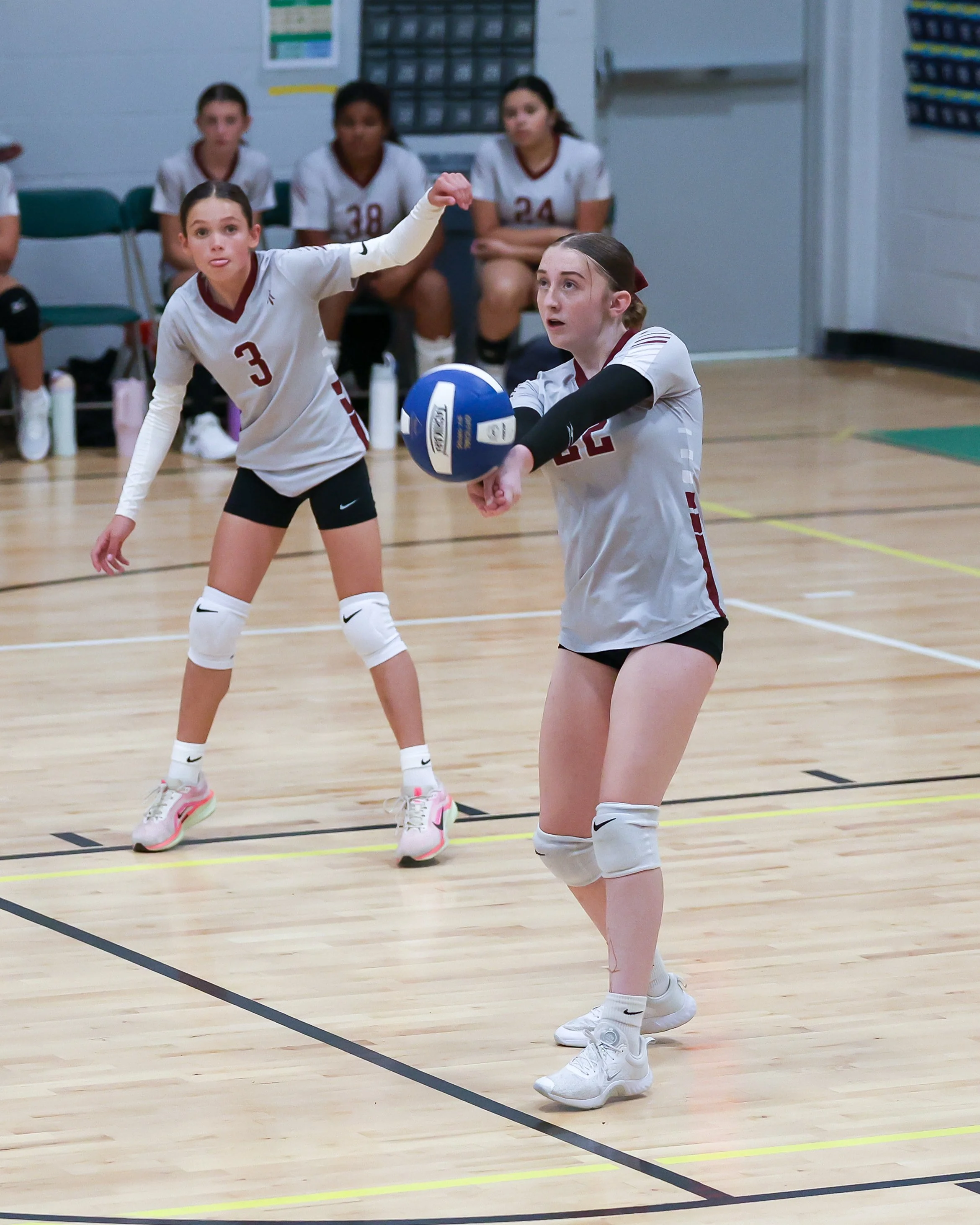 Mason girl returns the ball