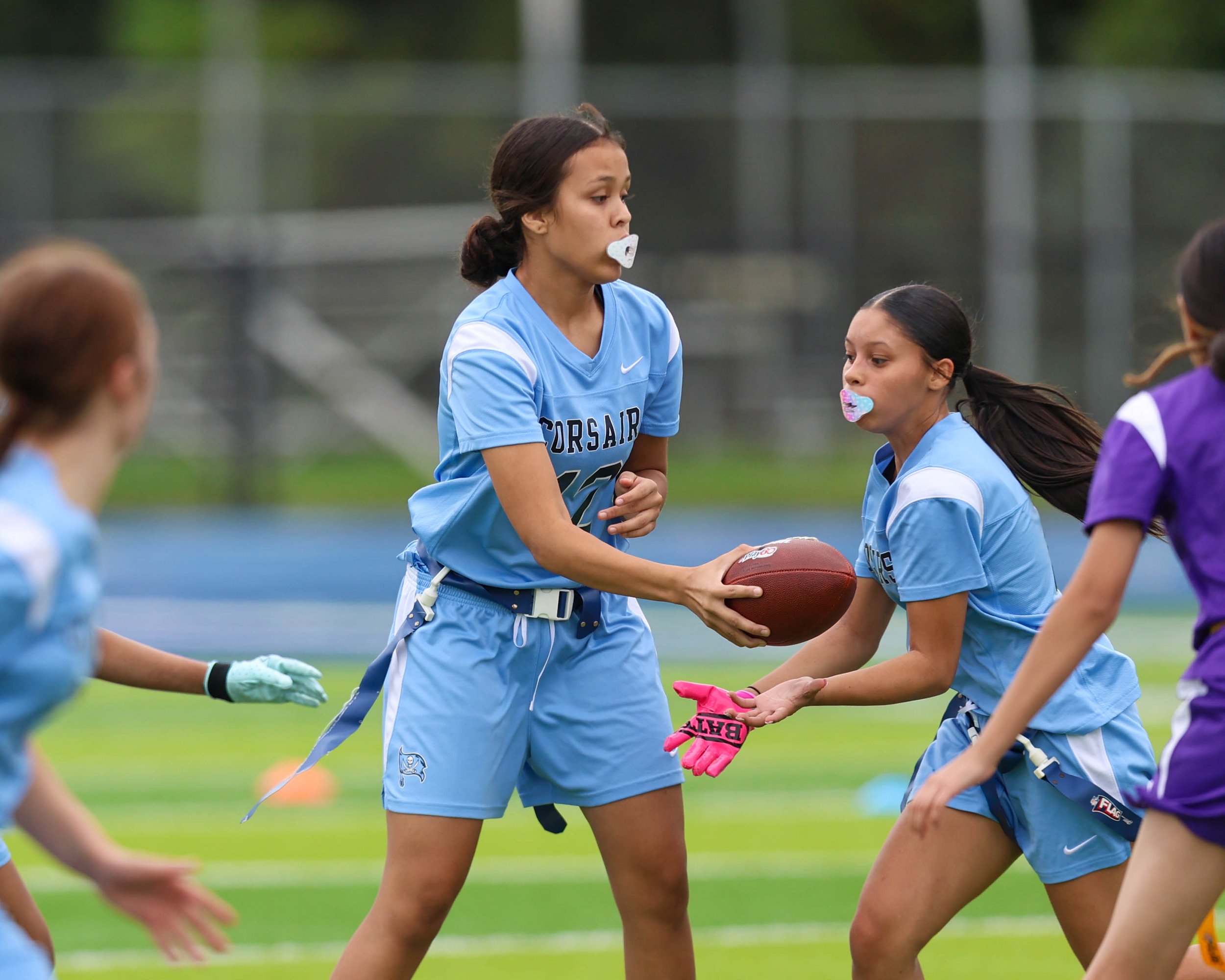 WM #12 hands the ball to WM #4