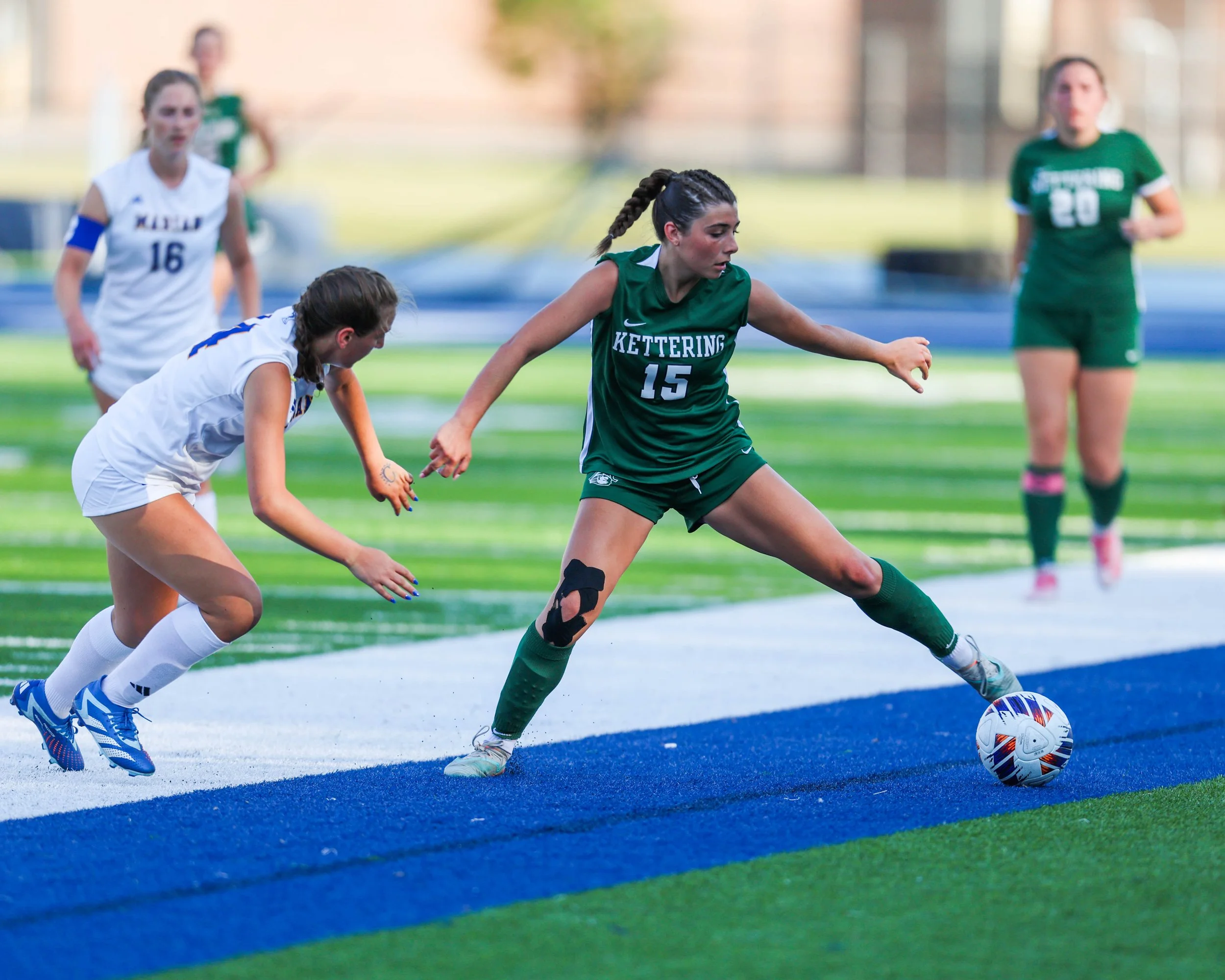 #15 controls the ball with her toe
