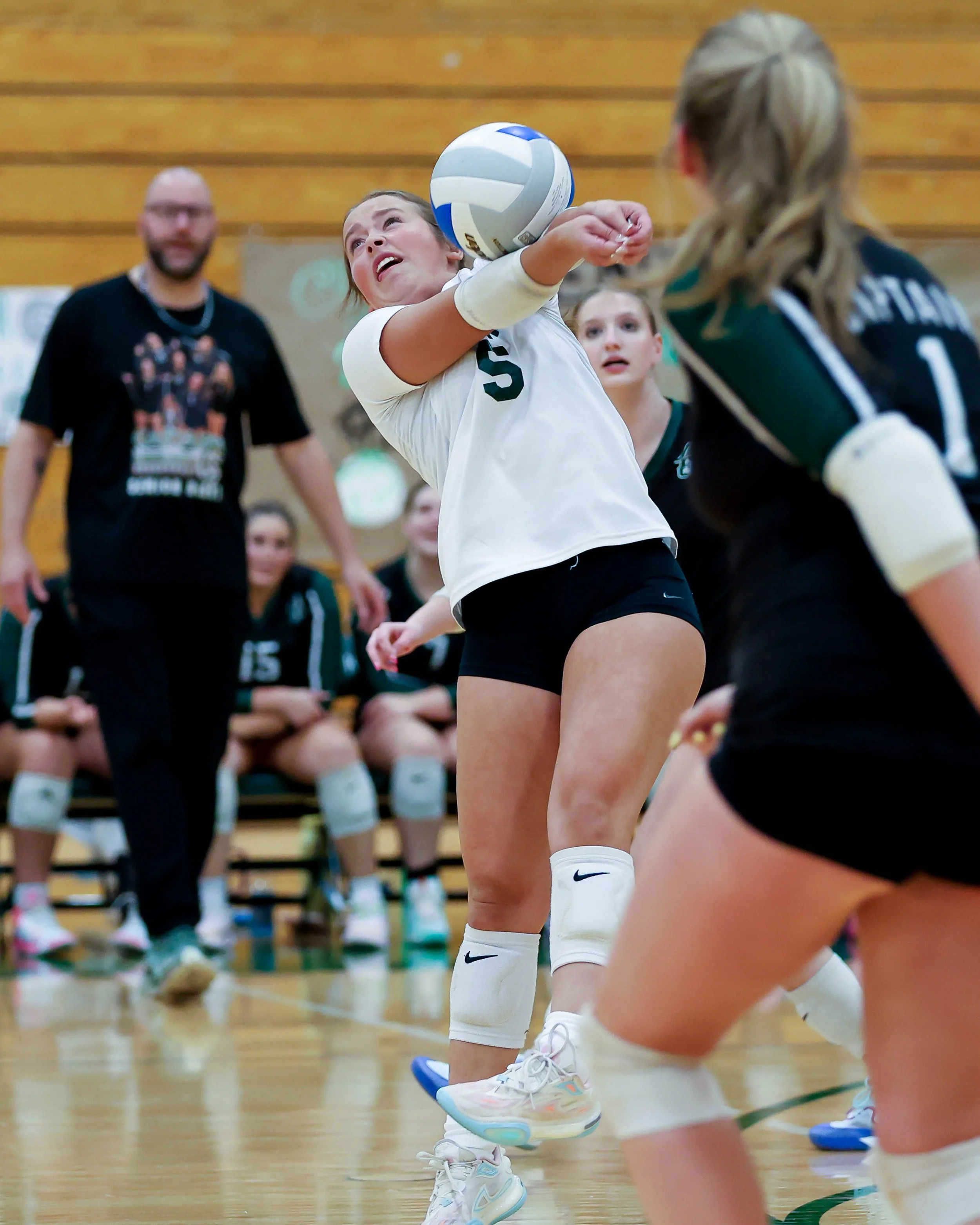 Kettering #5 returns the serve